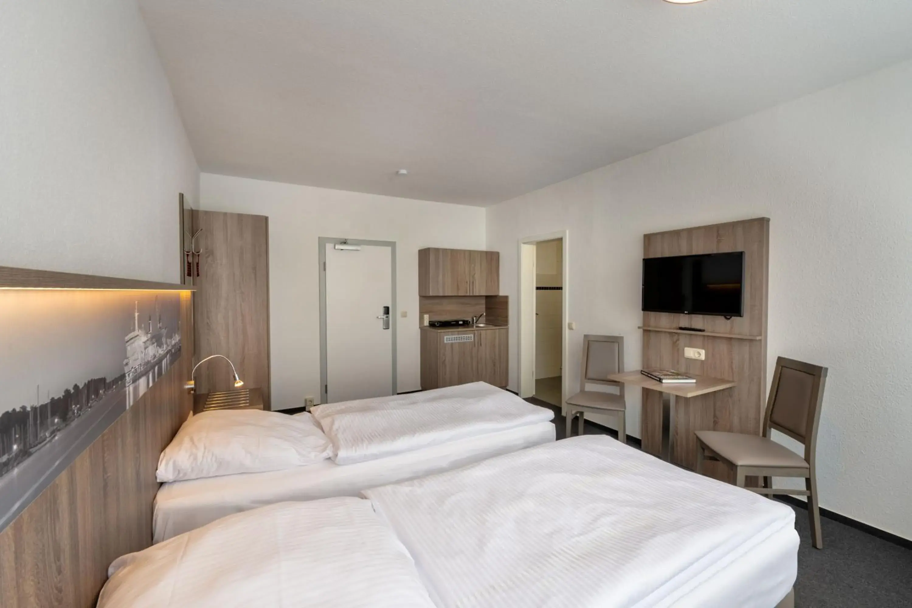 Comfort Twin Room with Shared Bathroom - single occupancy in Hotel & Gästehaus Rostock Lütten Klein Comfort Twin Room with Shared Bathroom - single occupancy in Hotel & Gästehaus Rostock Lütten Klein