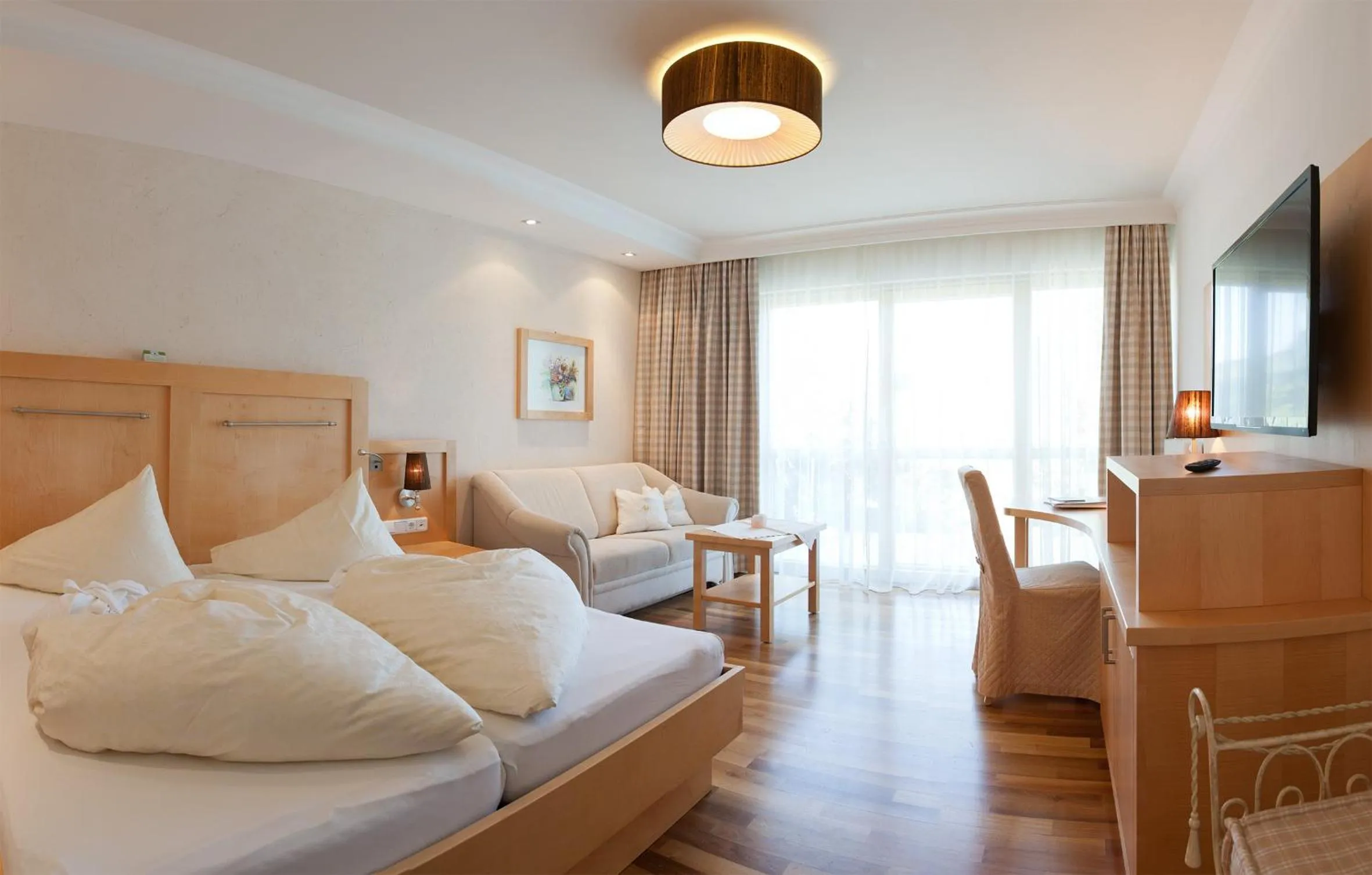 Photo of the whole room, Bed in Übergossene Alm Resort