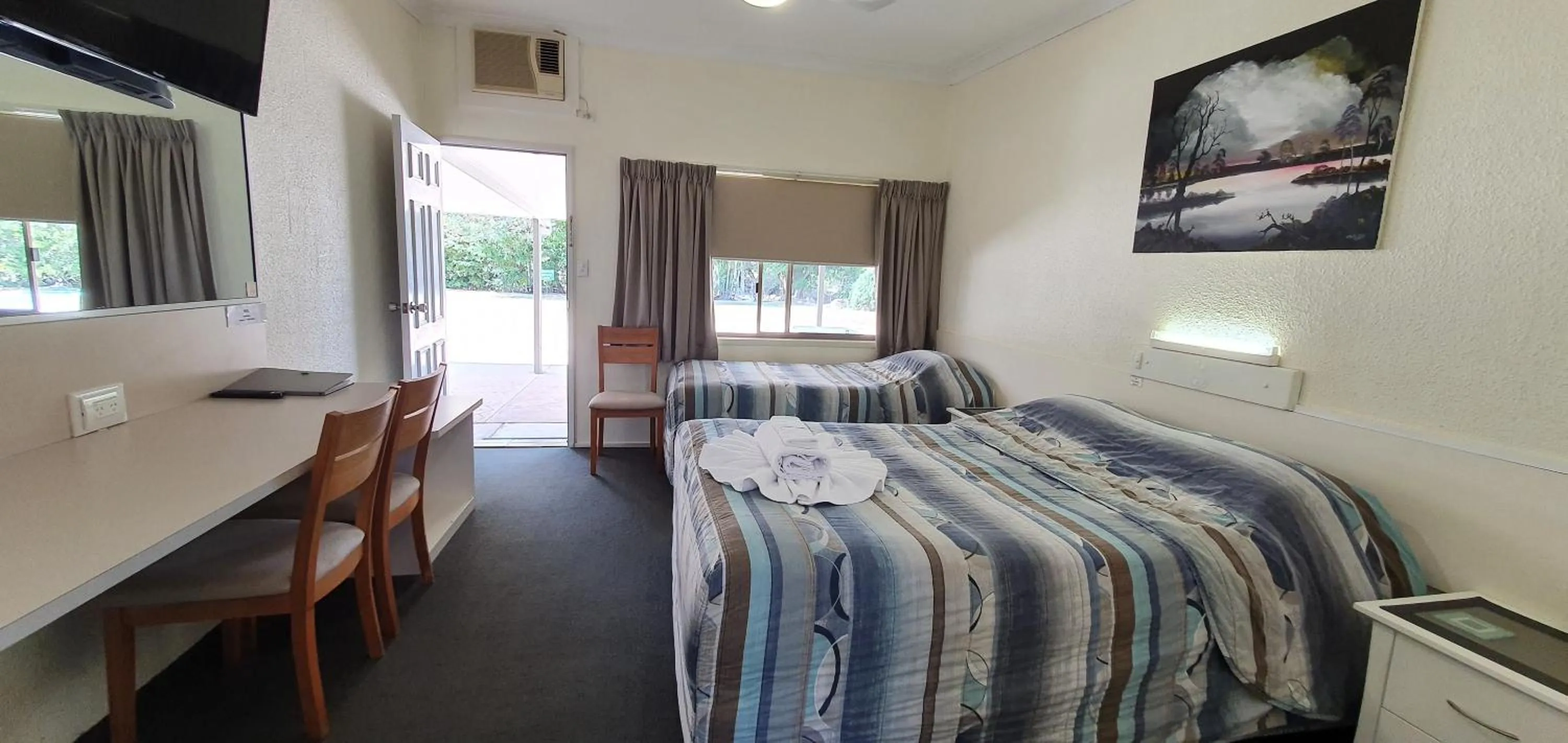 Photo of the whole room, Bed in Benaraby Hilltop MotorInn