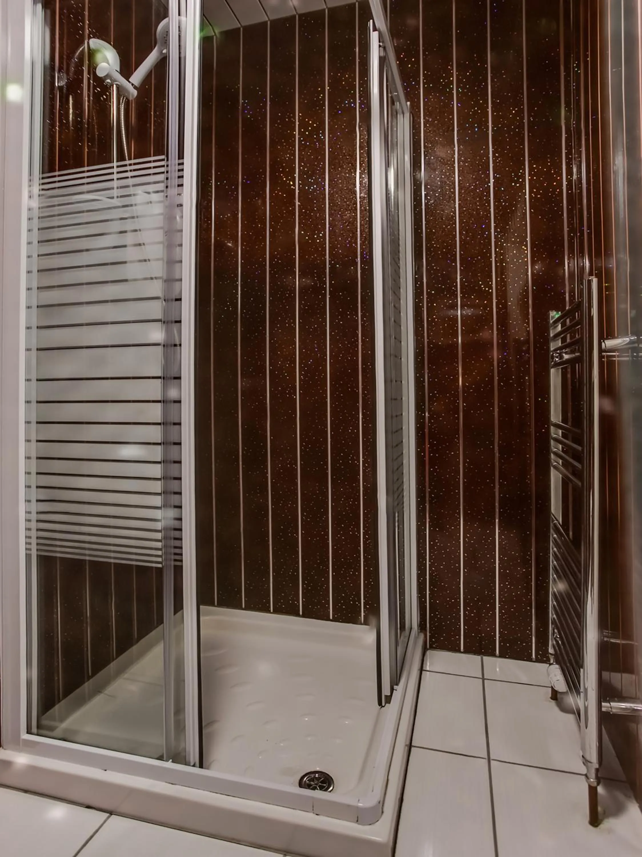 Bathroom in OYO Gin House Hotel