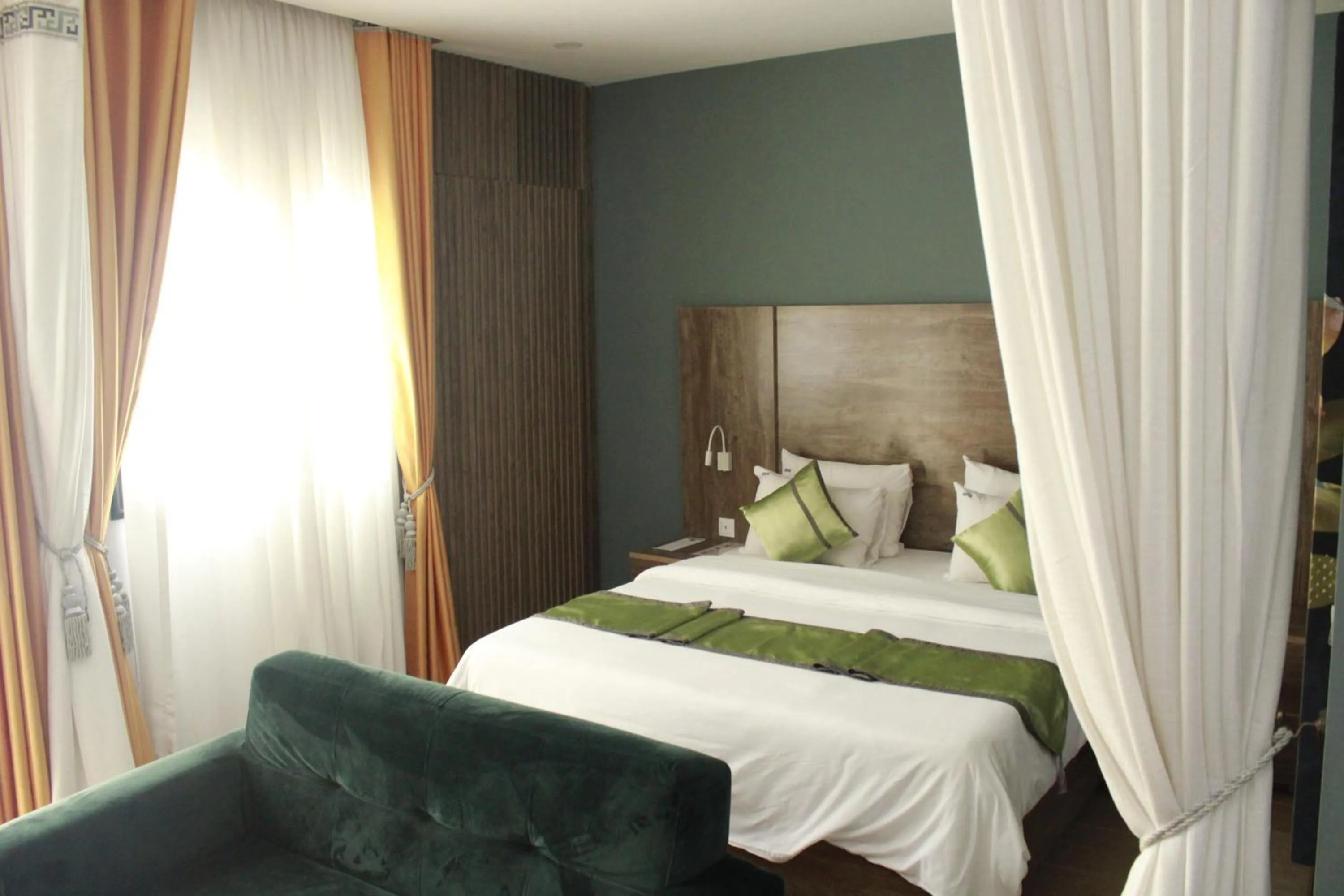 Bed in Bano Palace Hotel