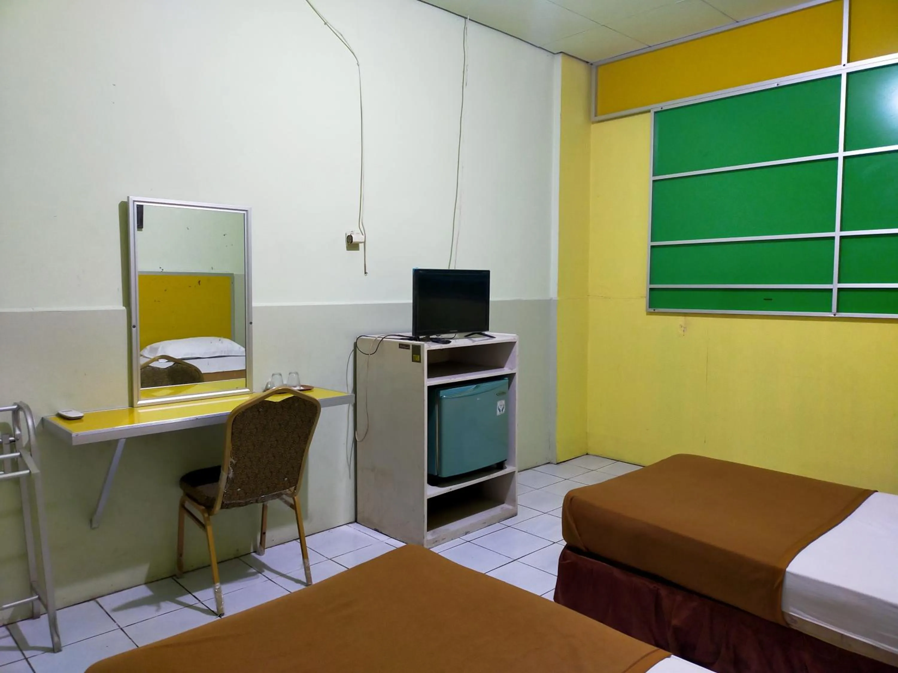 Bed in Hotel Nirwana Ternate RedPartner