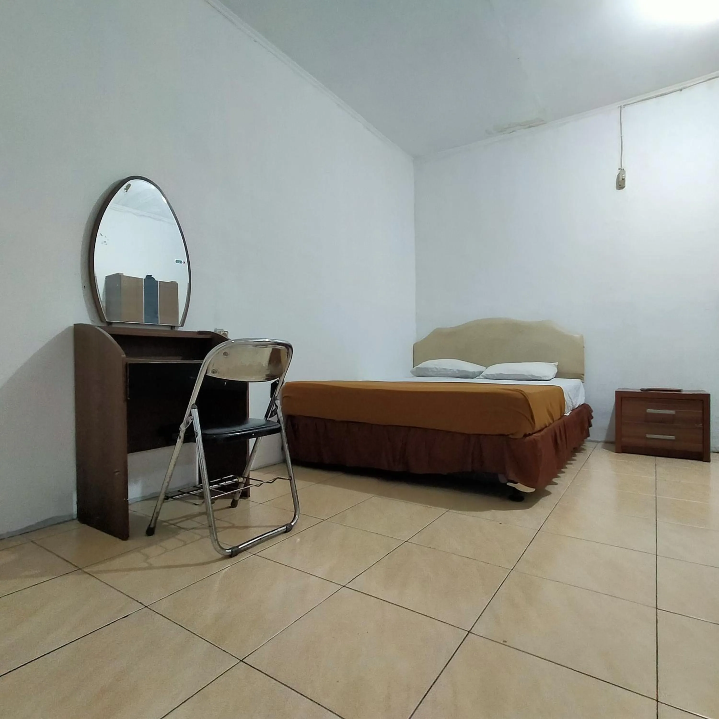 Bed in Hotel Nirwana Ternate RedPartner