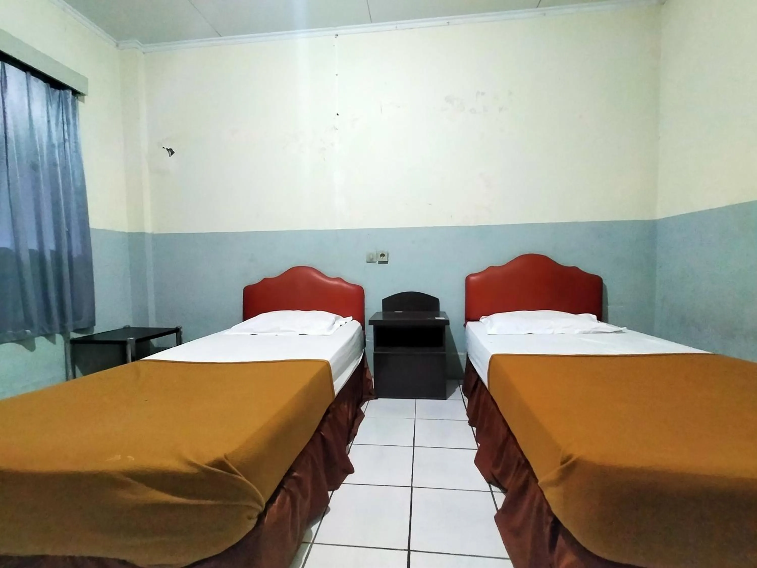 Bed in Hotel Nirwana Ternate RedPartner