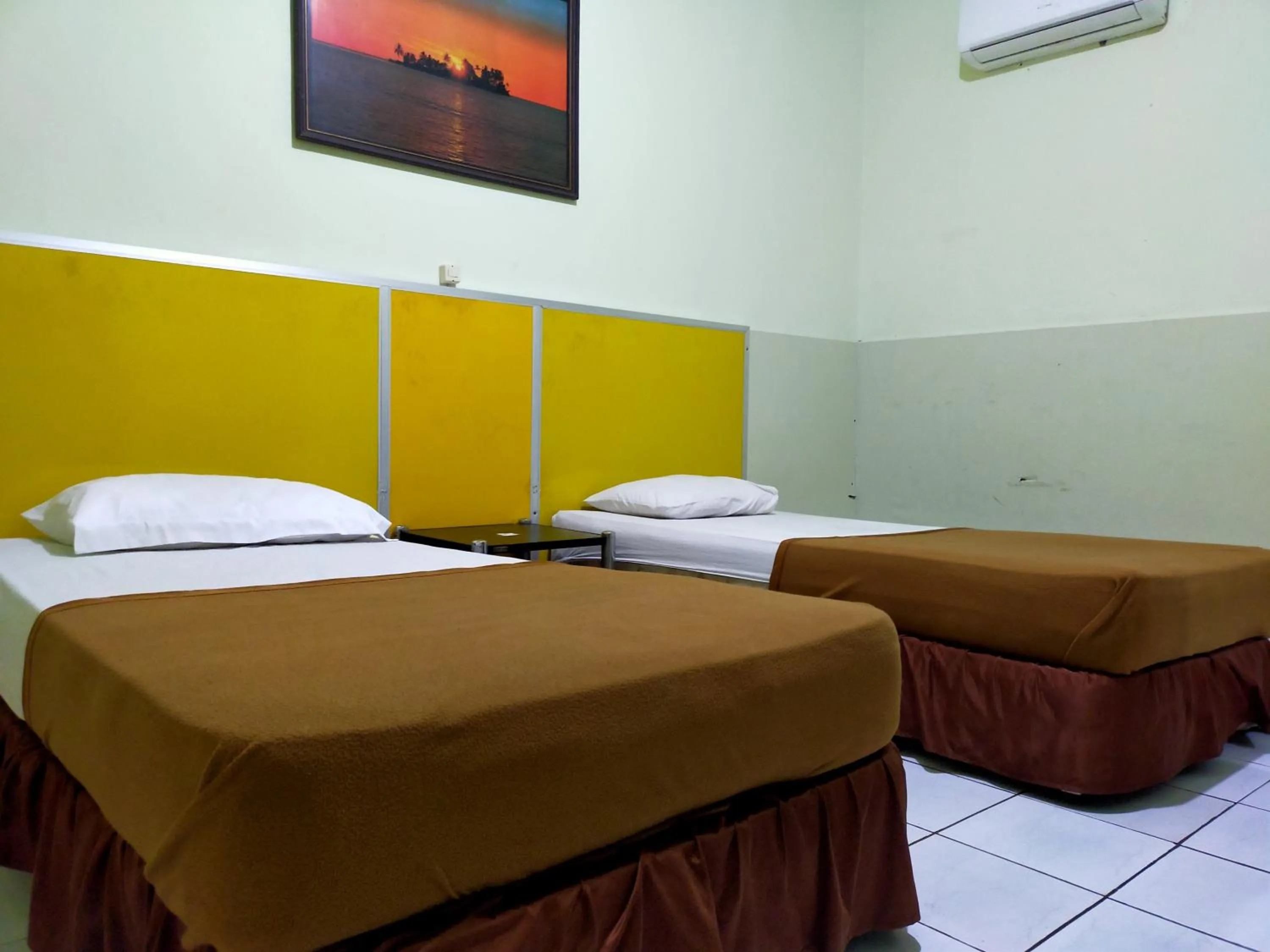 Bed in Hotel Nirwana Ternate RedPartner
