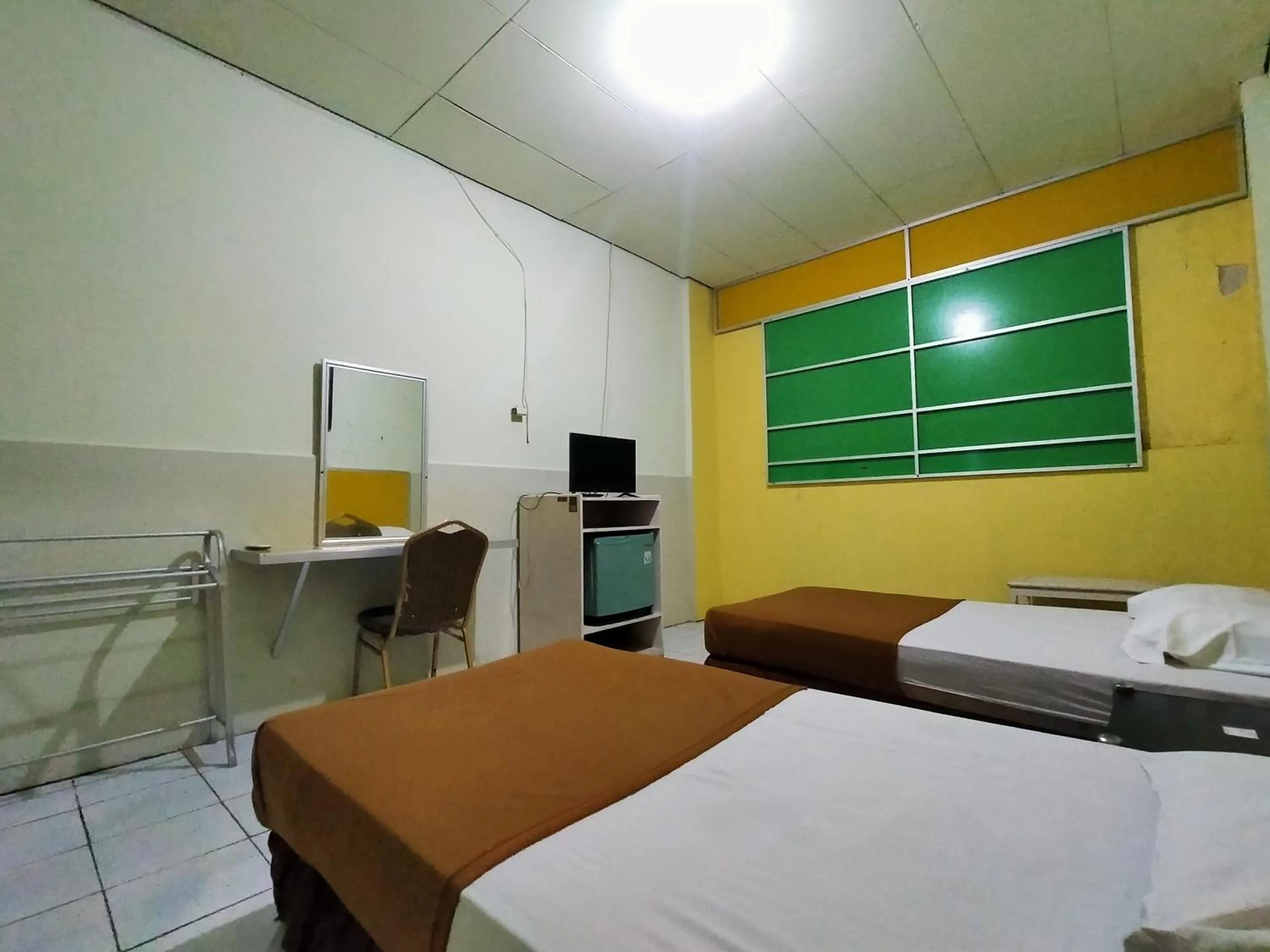 Bed in Hotel Nirwana Ternate RedPartner