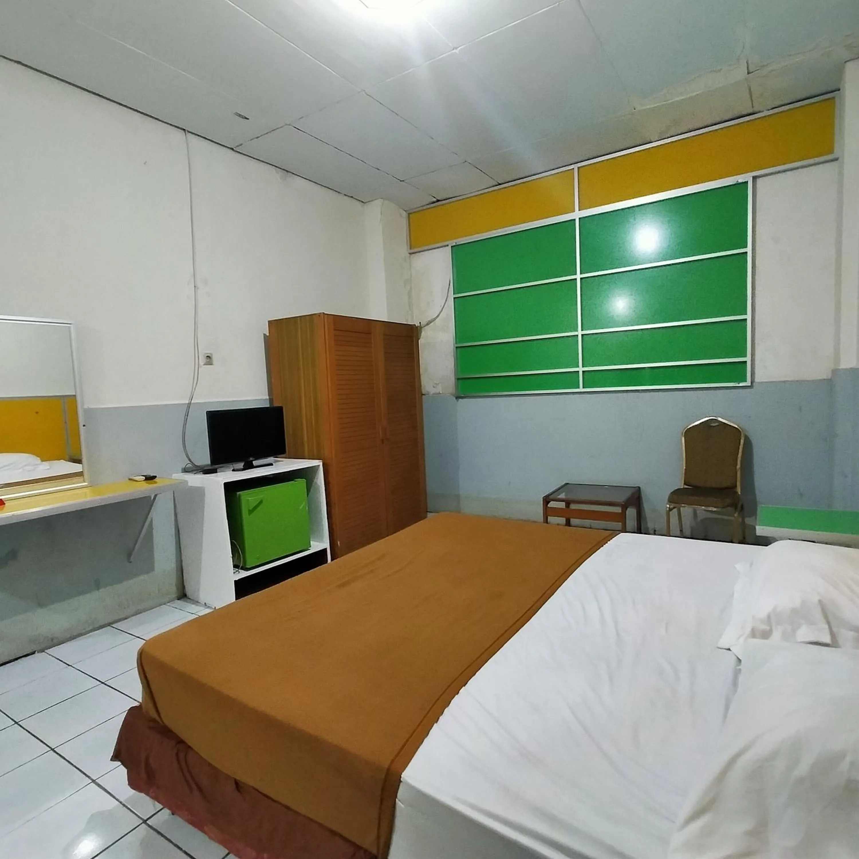 Bed in Hotel Nirwana Ternate RedPartner