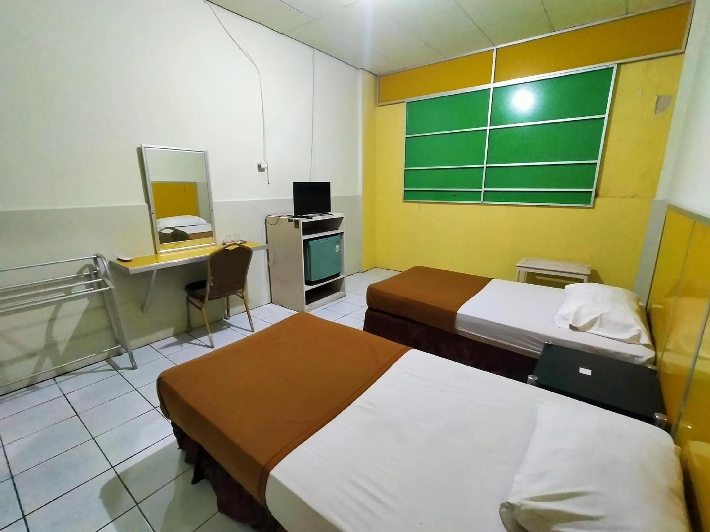 Bed in Hotel Nirwana Ternate RedPartner