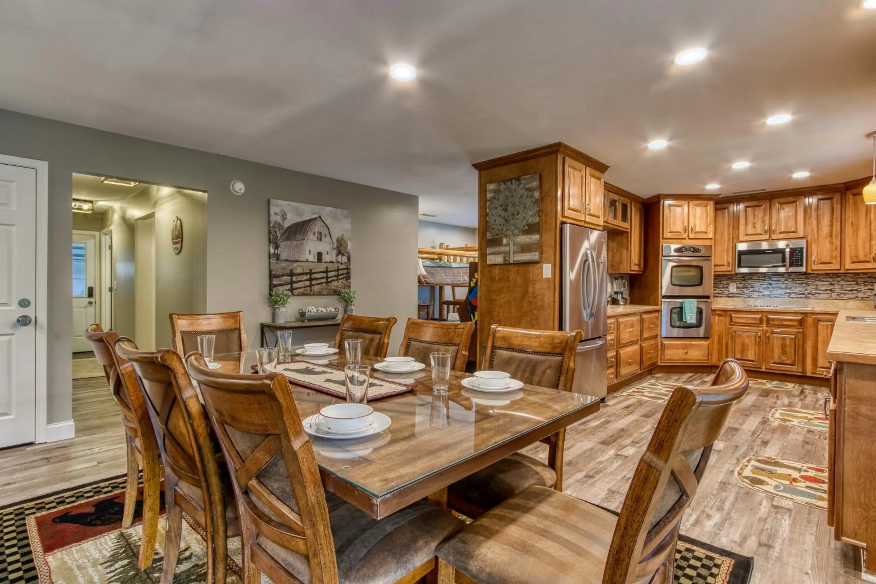 Kitchen or kitchenette in Rustic River Lodge by HoneyBearCabins 7BR 6BA sleeps 21