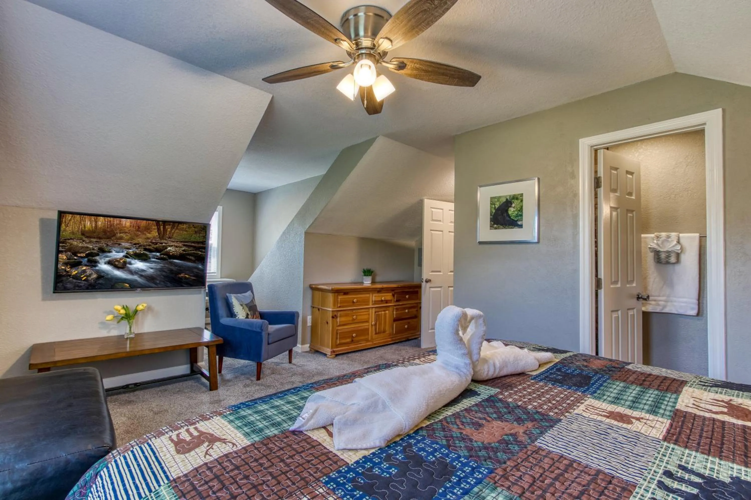 TV and multimedia in Rustic River Lodge by HoneyBearCabins 7BR 6BA sleeps 21