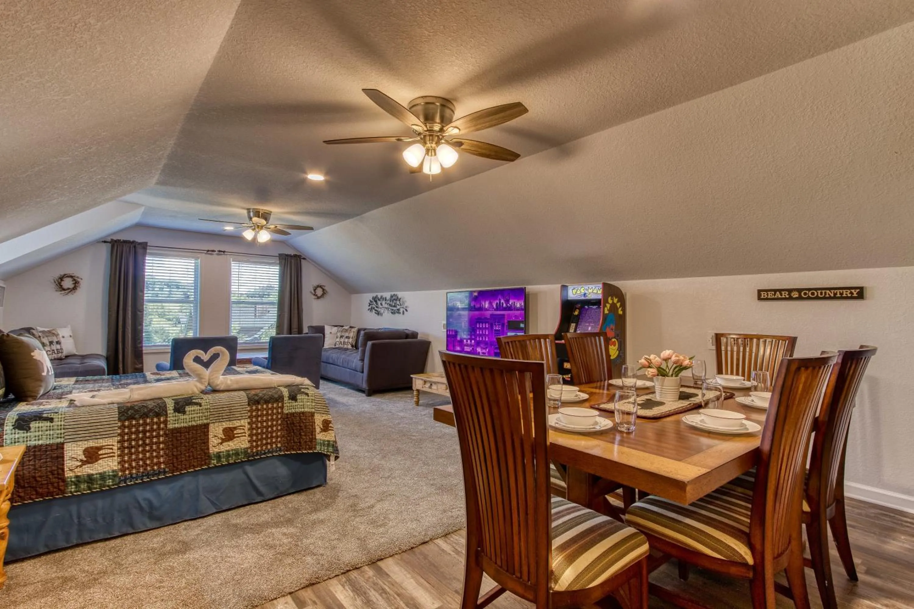 Bed in Rustic River Lodge by HoneyBearCabins 7BR 6BA sleeps 21