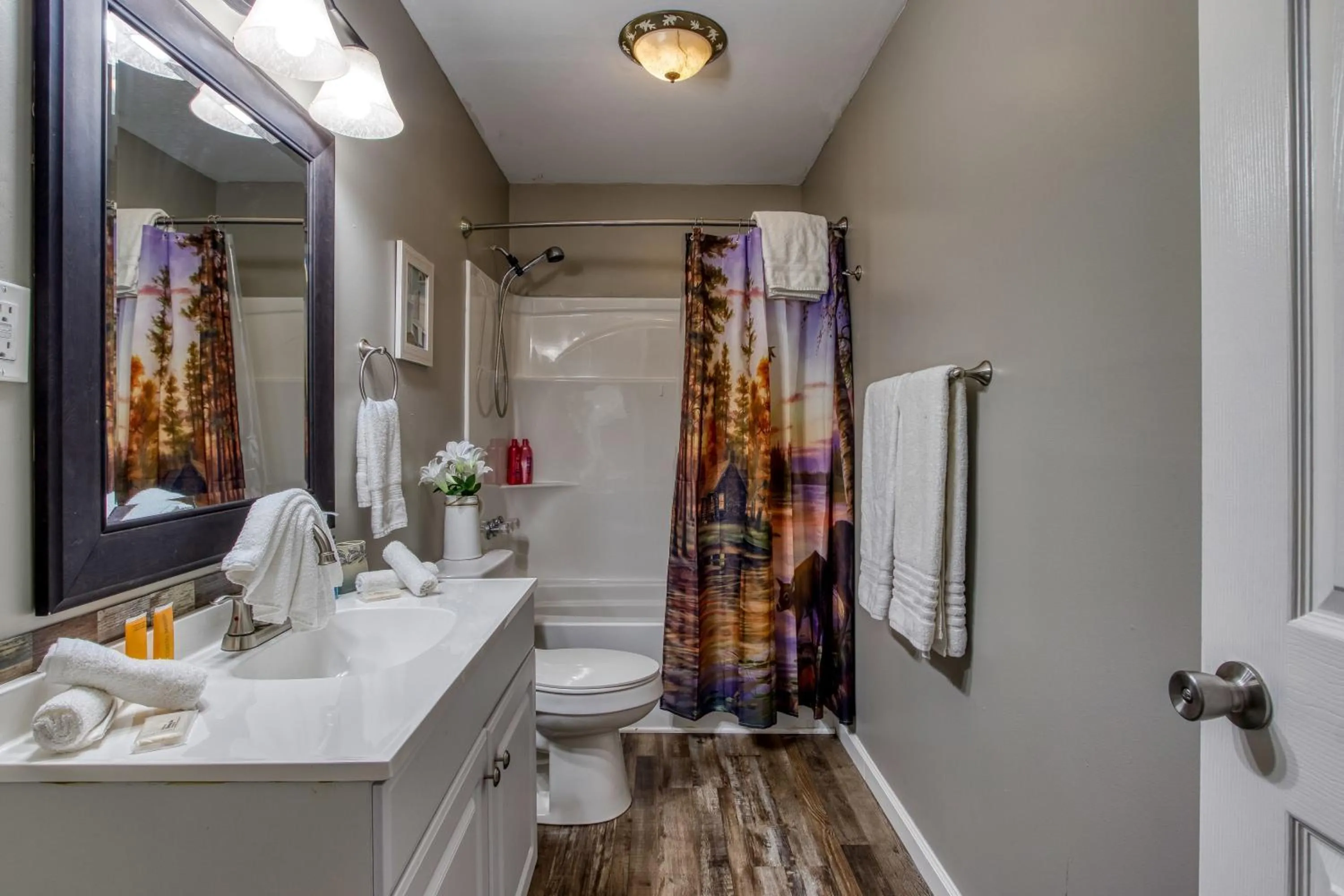 Shower in Rustic River Lodge by HoneyBearCabins 7BR 6BA sleeps 21