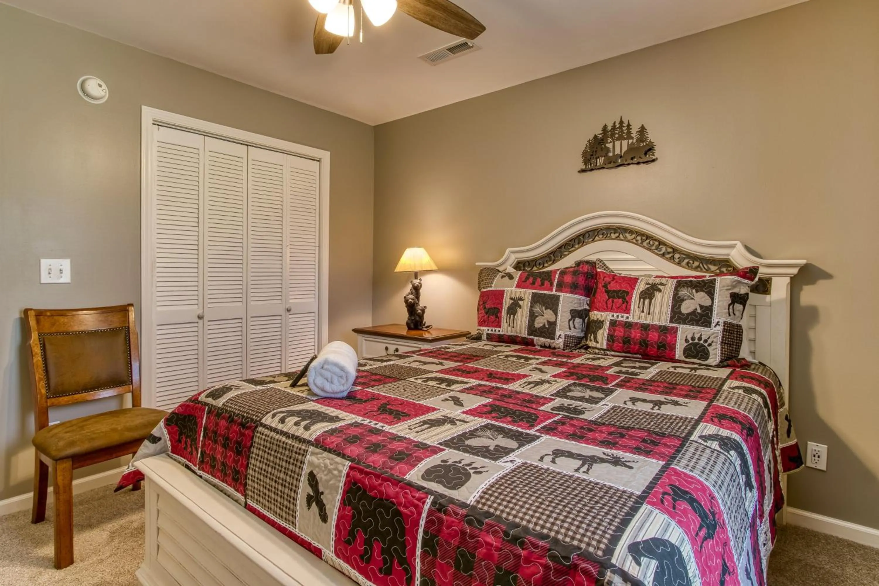 Bed in Rustic River Lodge by HoneyBearCabins 7BR 6BA sleeps 21