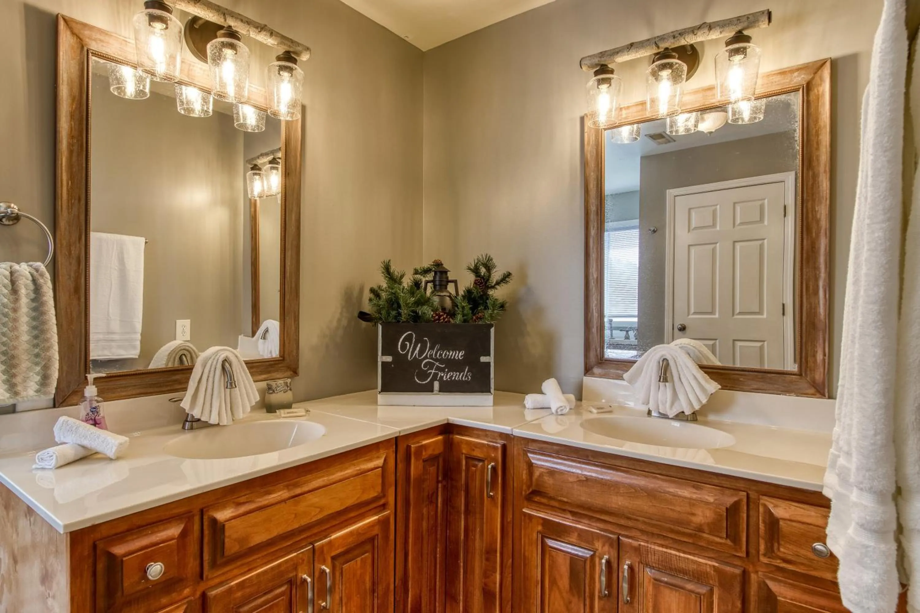 Bathroom in Rustic River Lodge by HoneyBearCabins 7BR 6BA sleeps 21