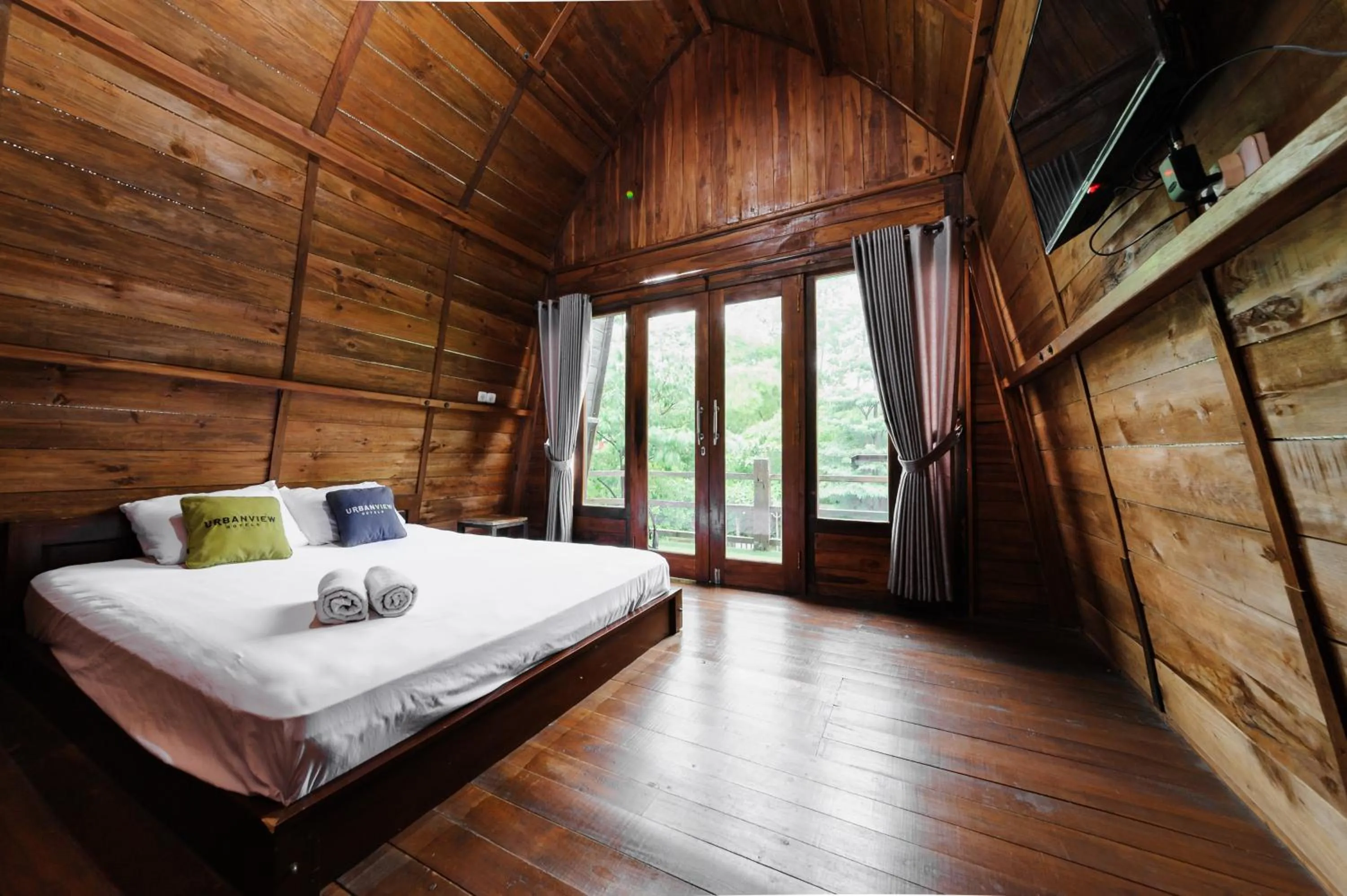 Bedroom, Bed in Urbanview Hotel Cianjur City Park by RedDoorz