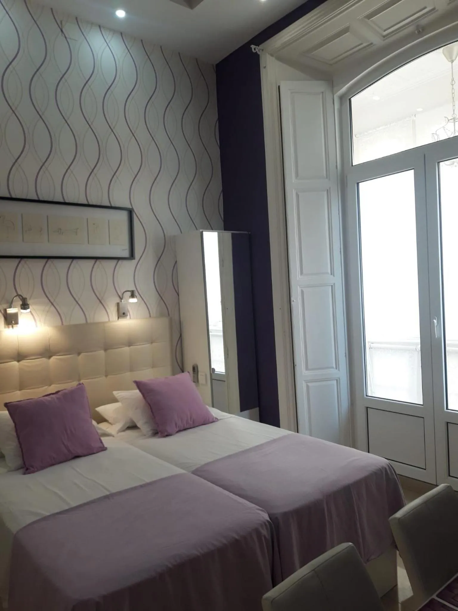 Bed in Apartamentos Marques De La Merced