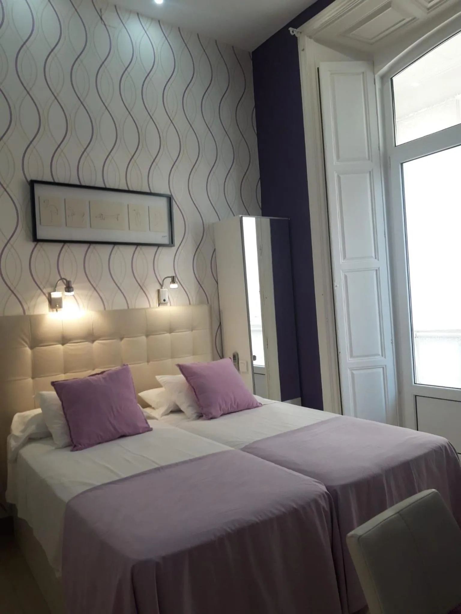 Bed in Apartamentos Marques De La Merced