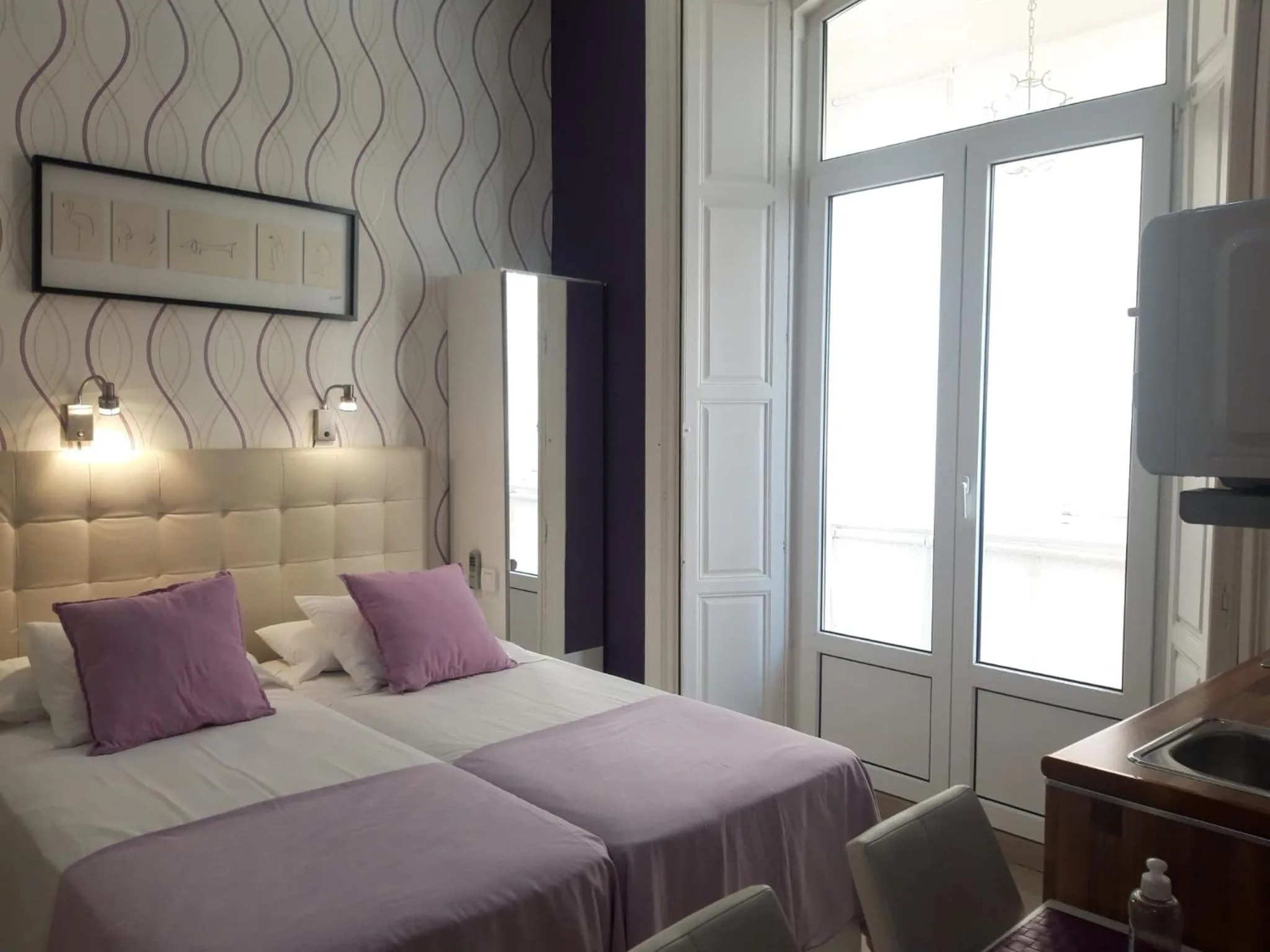 Bed in Apartamentos Marques De La Merced