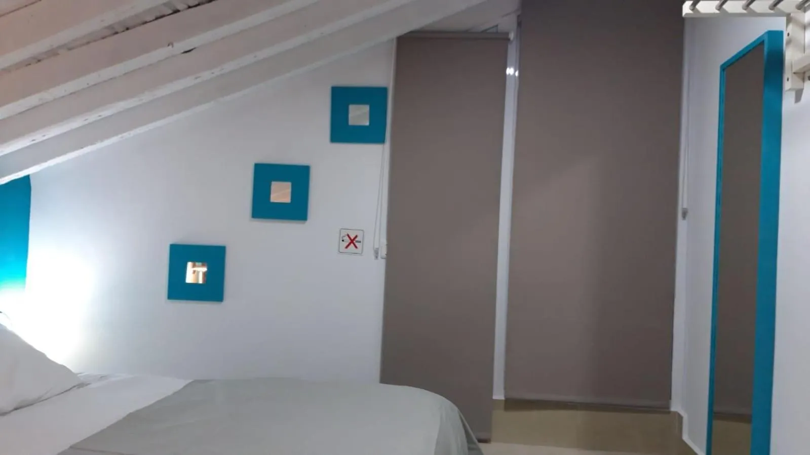 Bed in Apartamentos Marques De La Merced