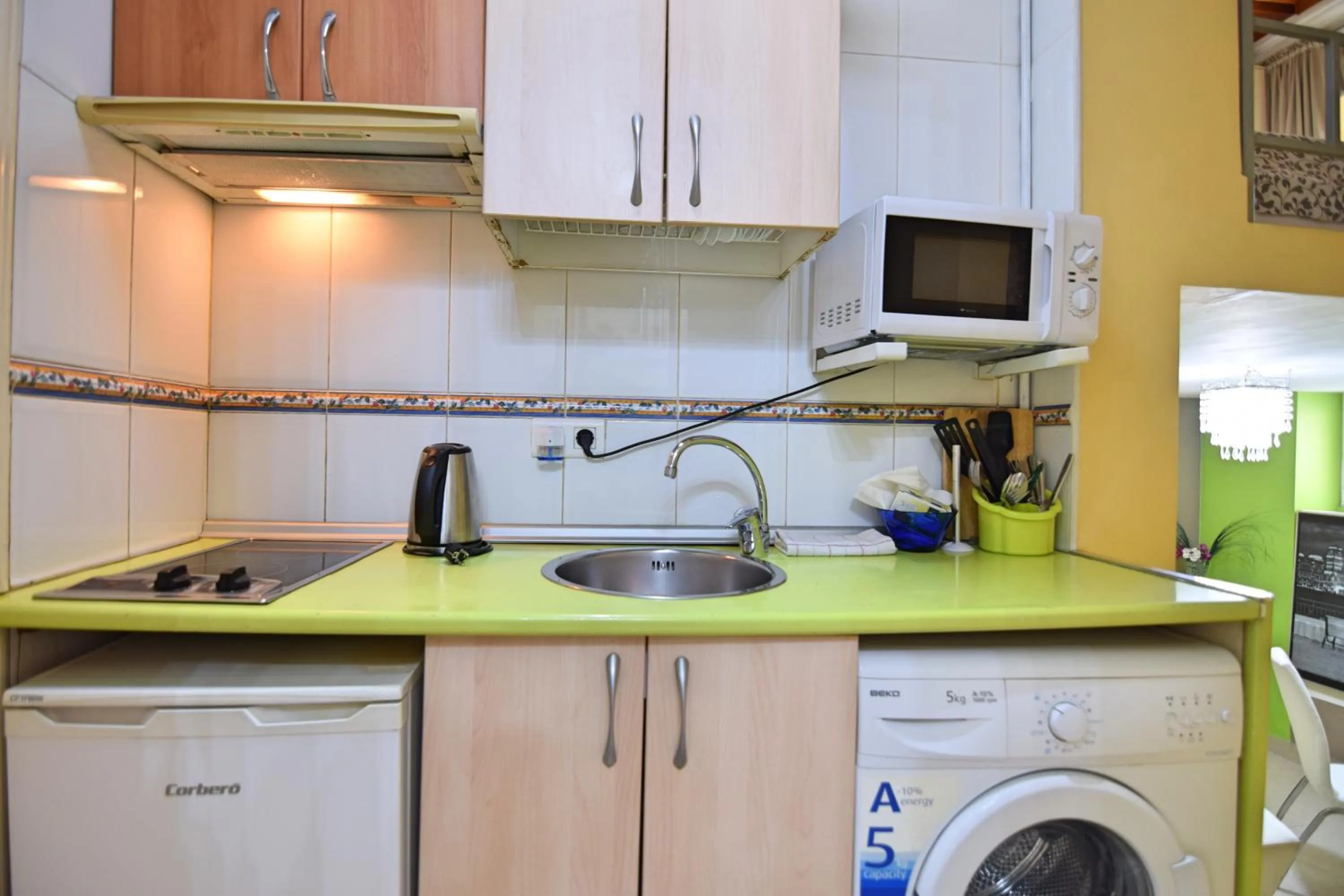 Kitchen or kitchenette in Apartamentos Marques De La Merced