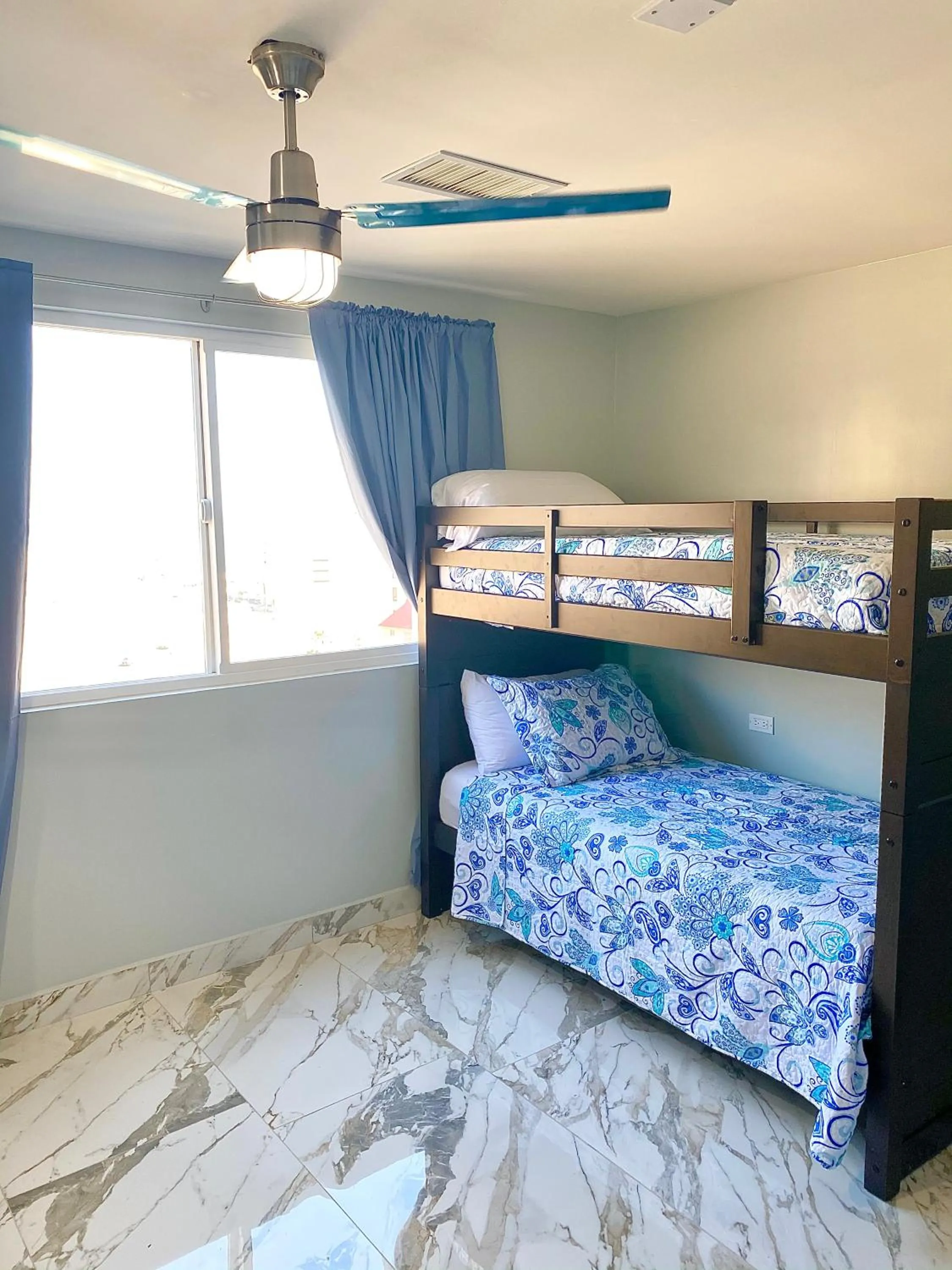 Bed in Beachfront Condo close Puerto Nuevo, Papas, and Valle de Guadalupe