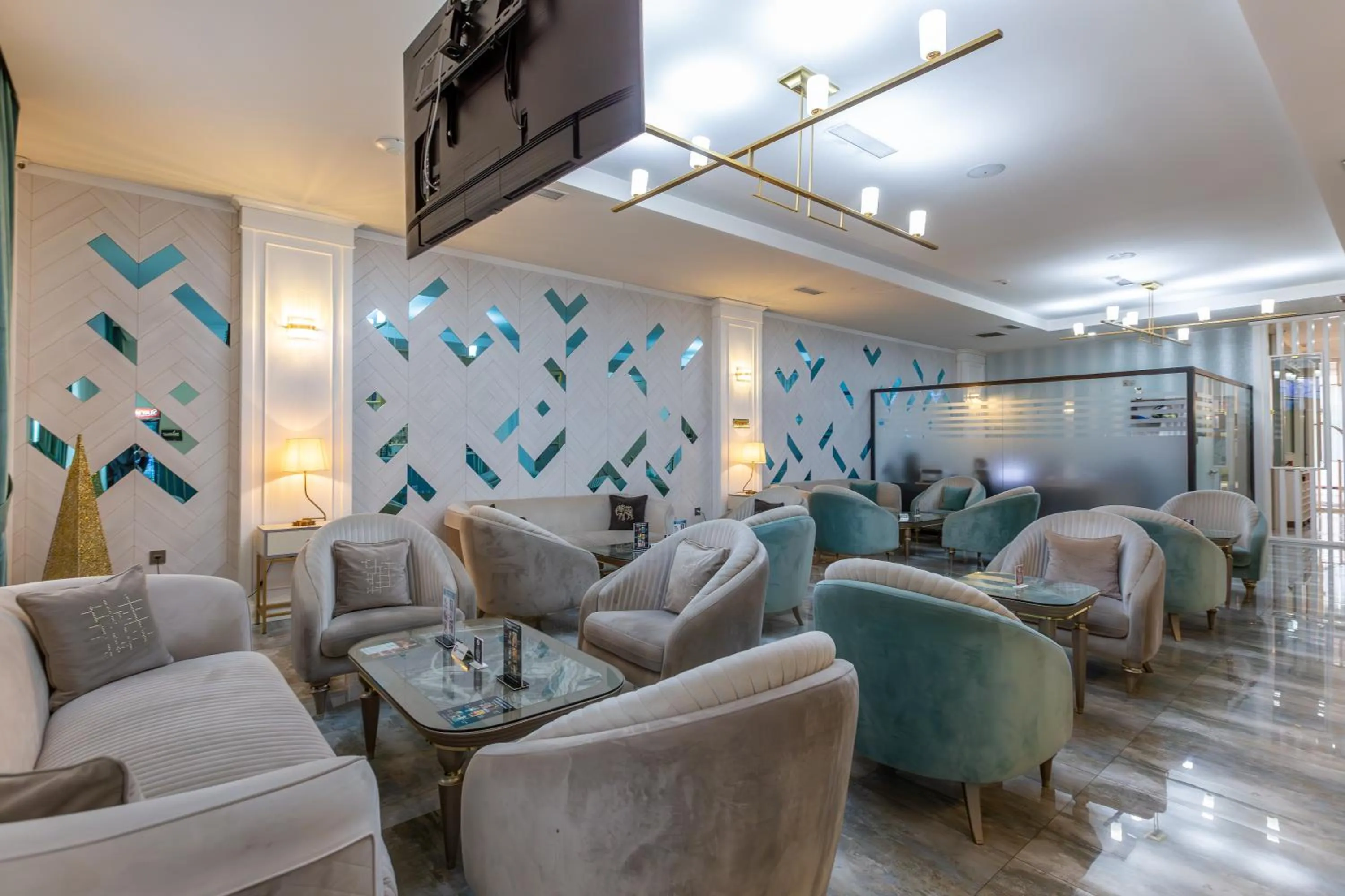 Communal lounge/ TV room in ALBA HOTEL & SPA