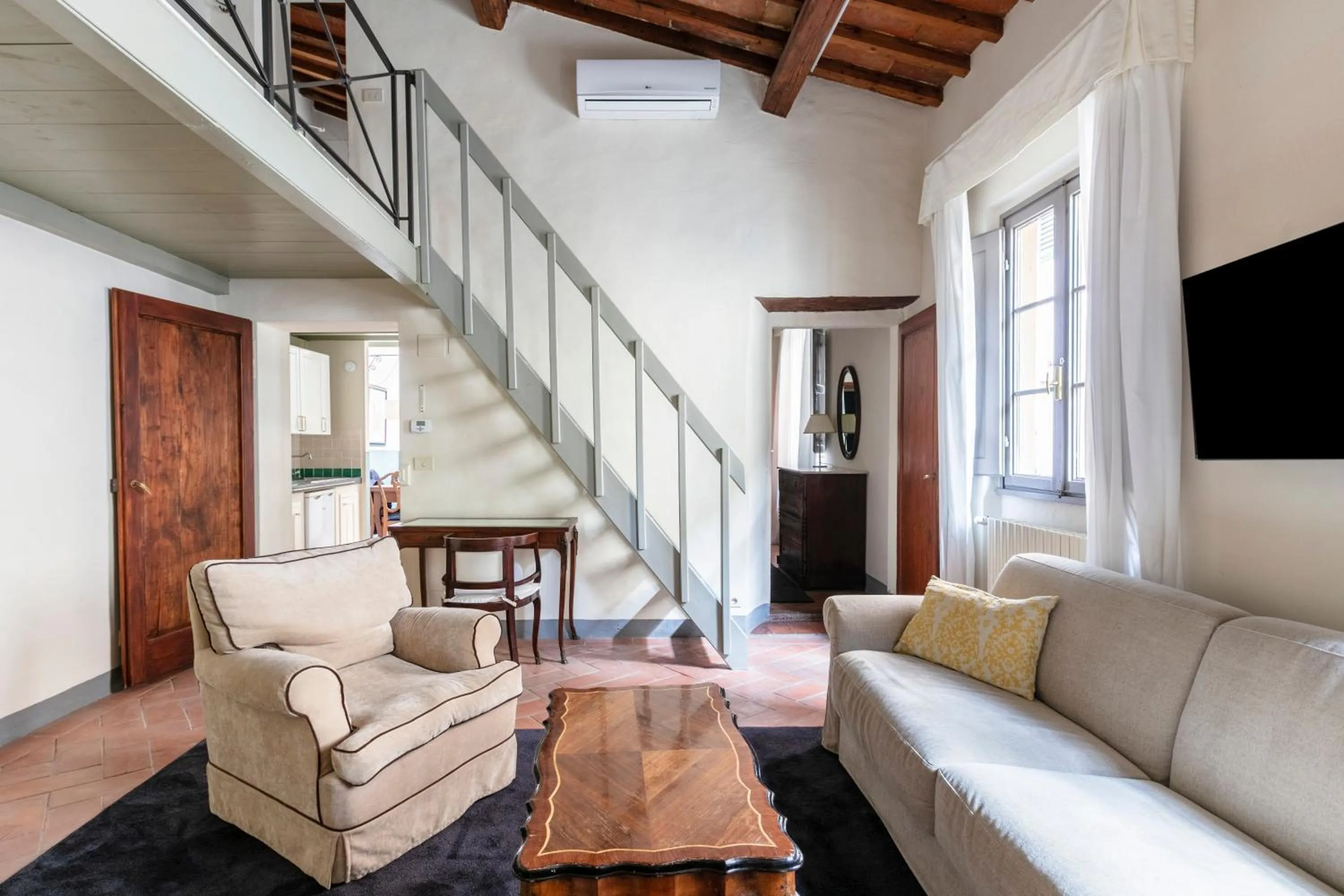 Living room in Numa Florence Palazzo Belfiore