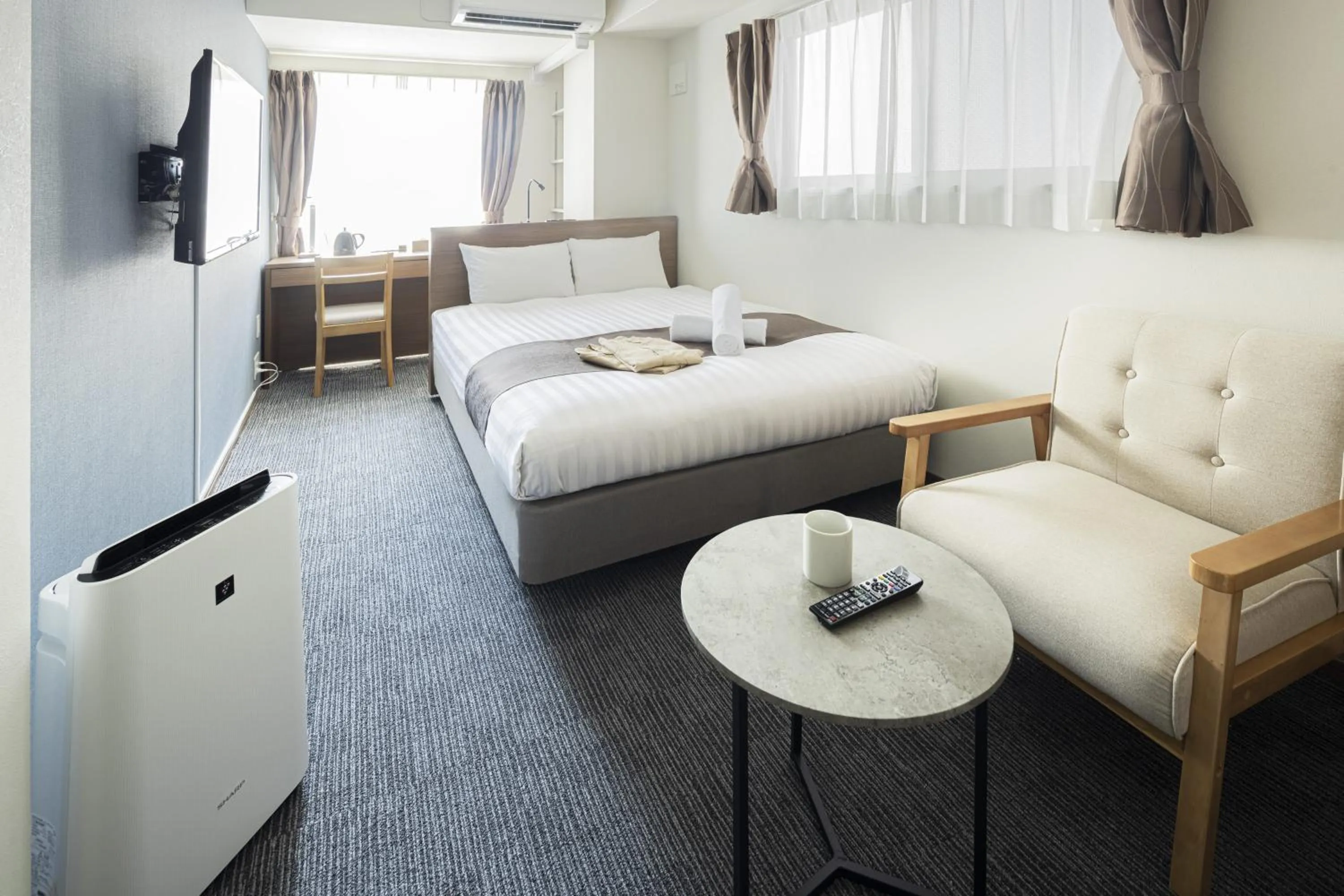 Photo of the whole room, Bed in Coruscant Hotel NagasakiekiⅢ