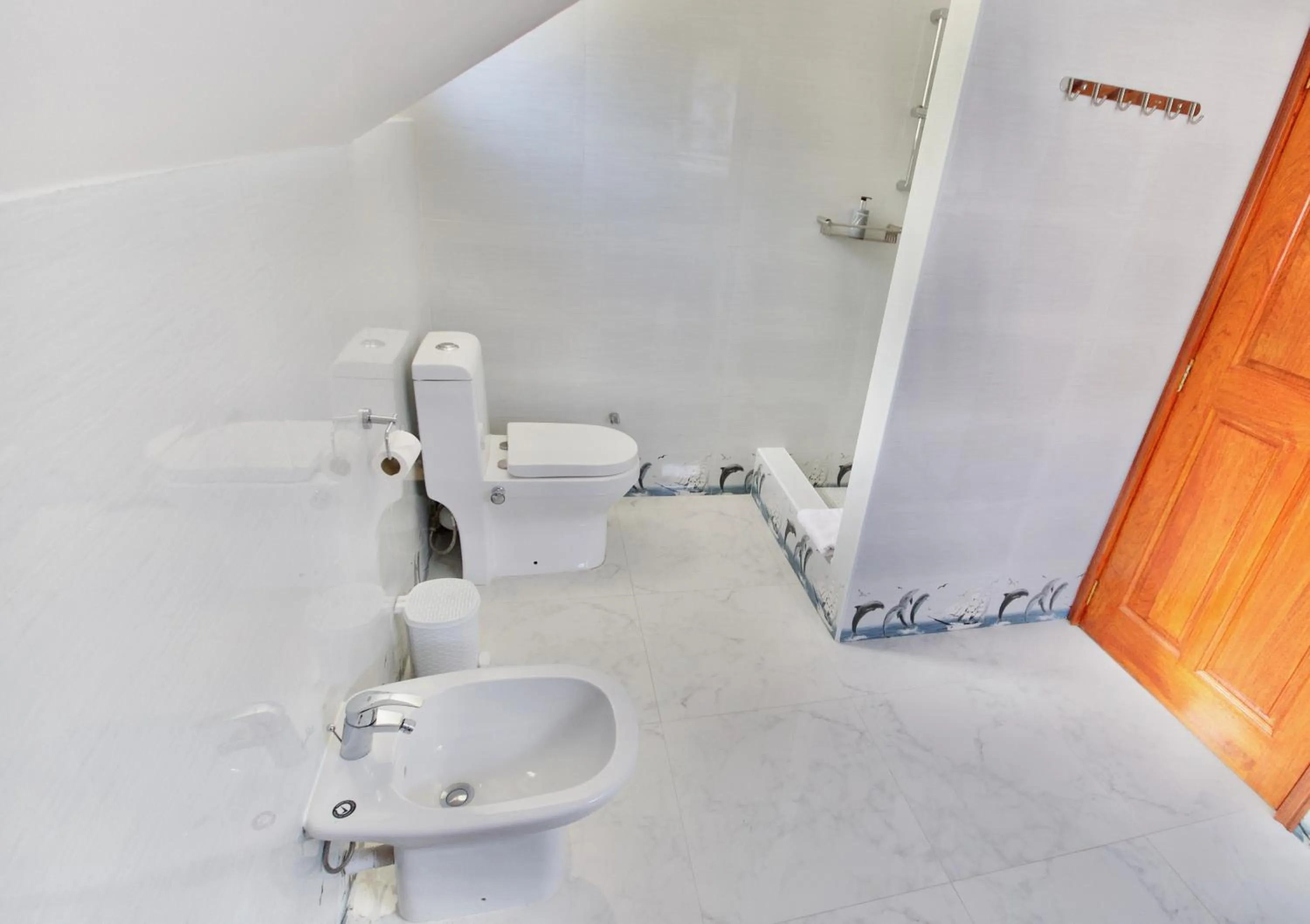 Bathroom in SEA SPLASH SELF CATERING And La Petite Maison