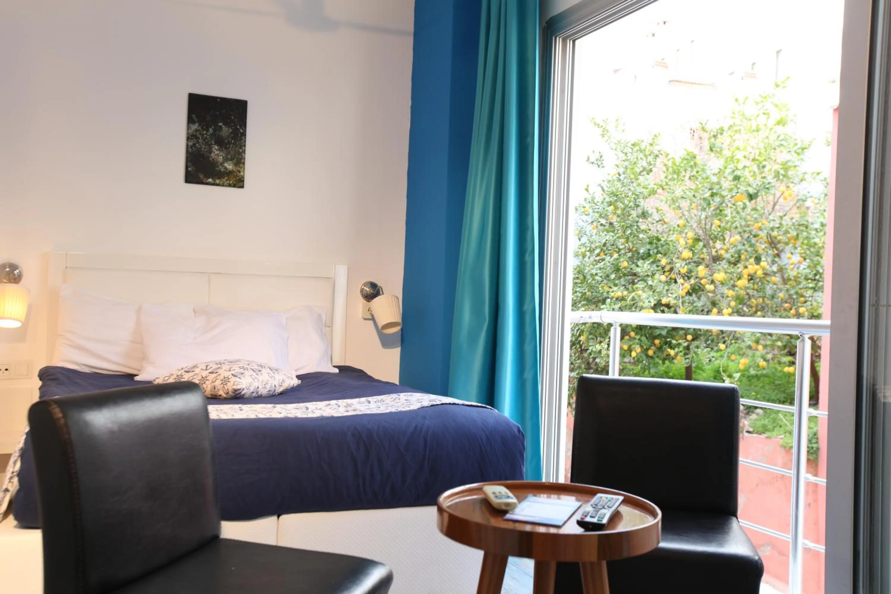 Photo of the whole room, Bed in Larimar Hotel Cesme