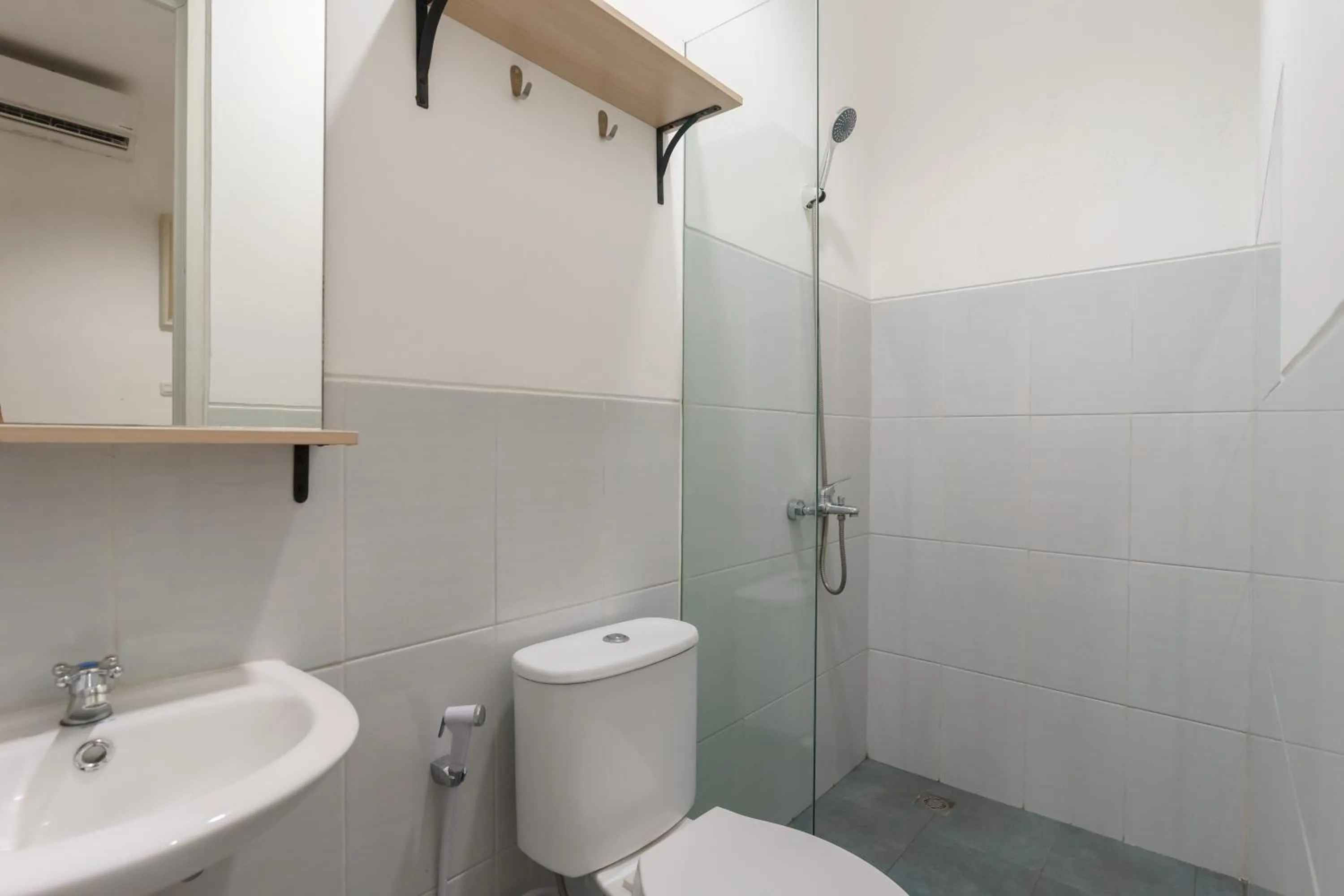 Bathroom in RedDoorz near Seasons City Mall 3