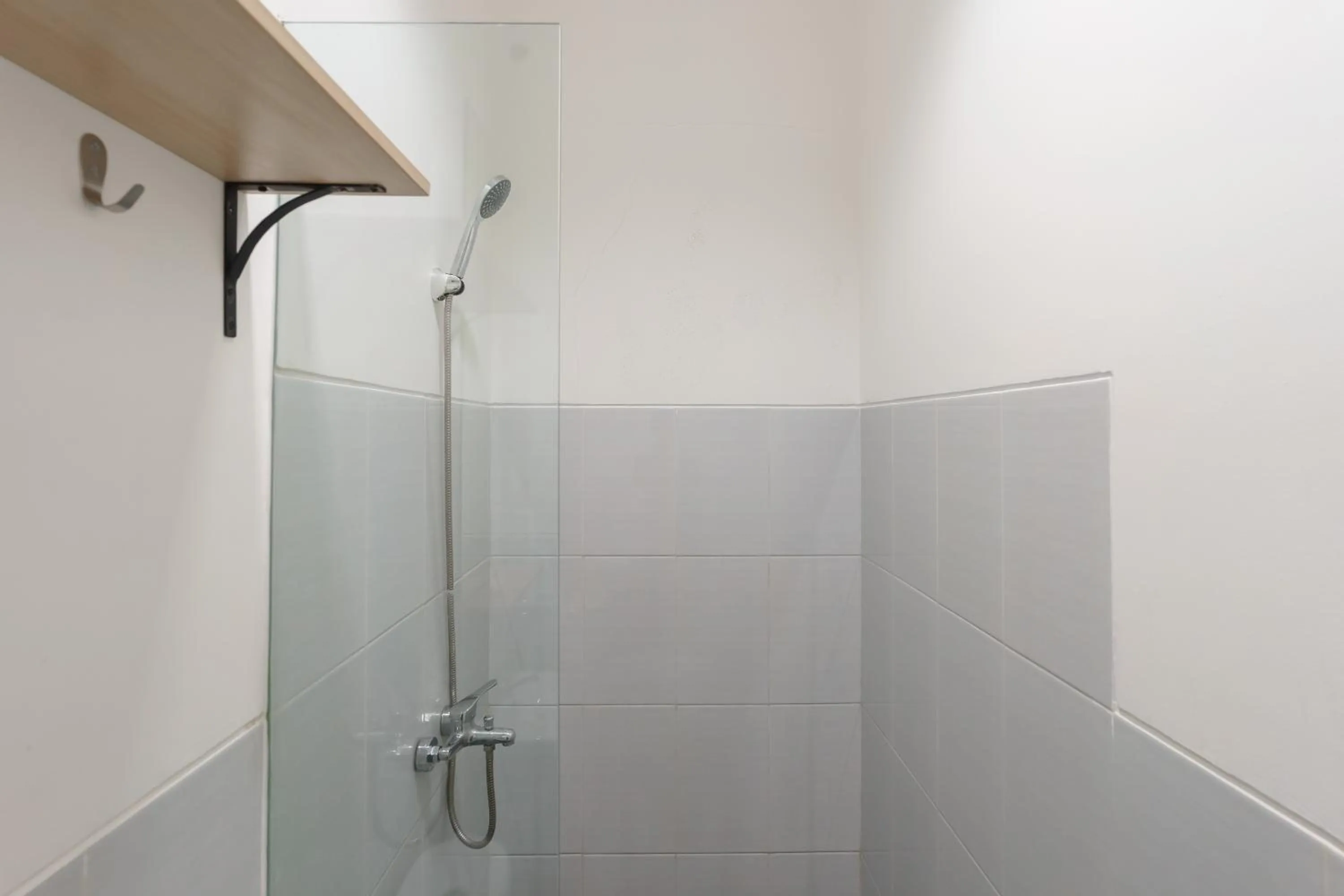 Bathroom in RedDoorz near Seasons City Mall 3