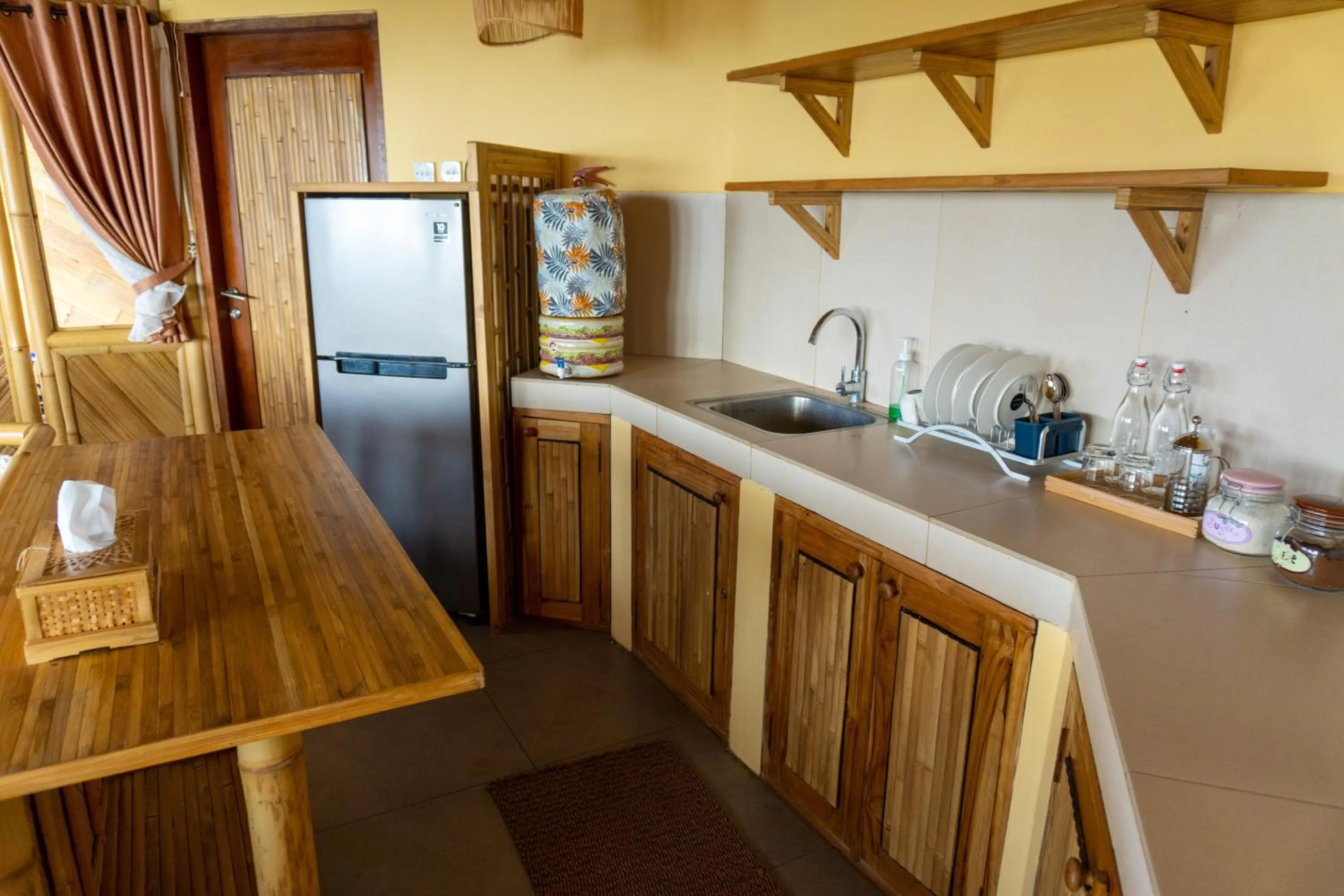 Kitchen or kitchenette in Elang Hillside Bamboo Villas