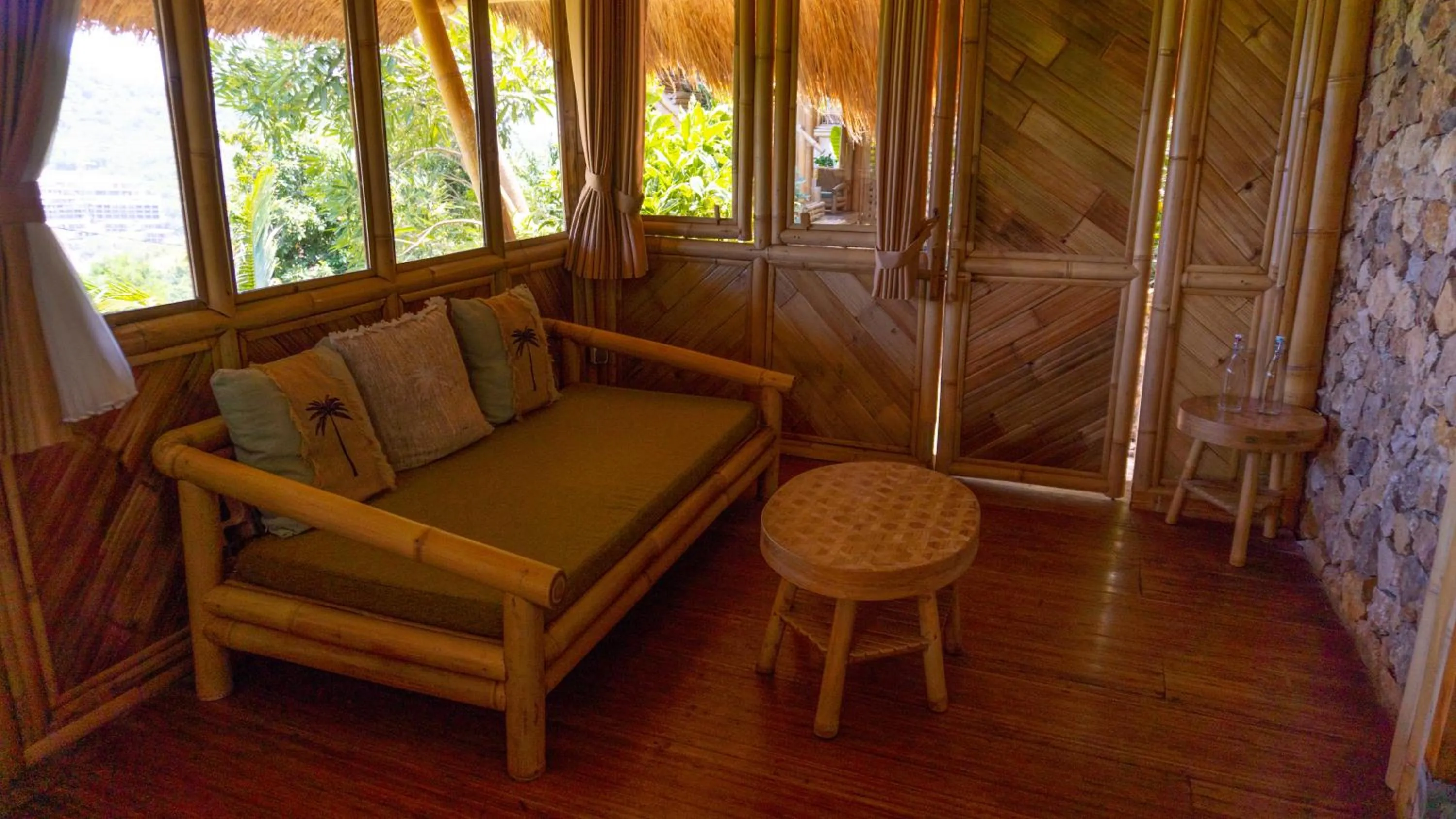 Seating area in Elang Hillside Bamboo Villas