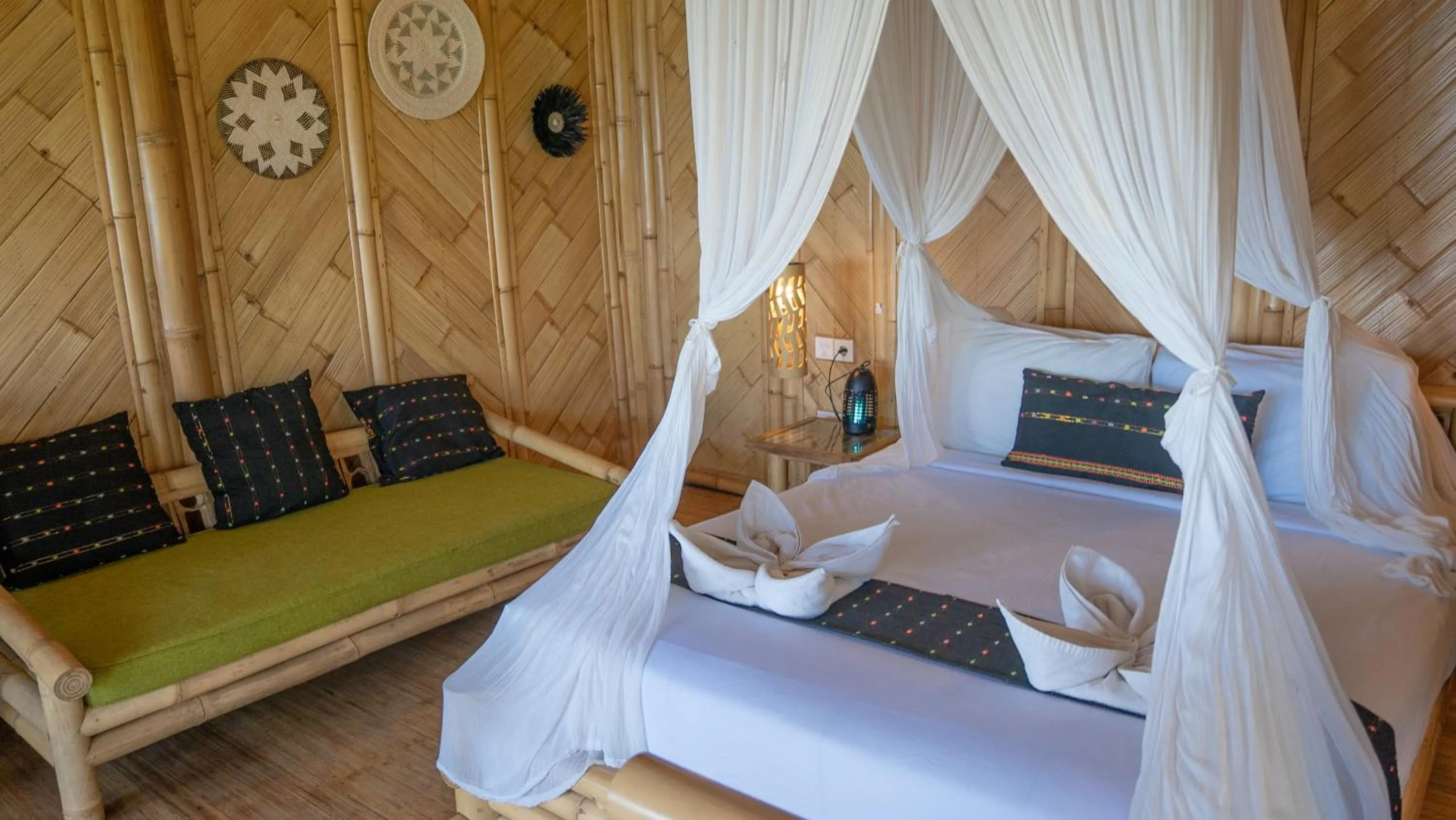 Bed in Elang Hillside Bamboo Villas
