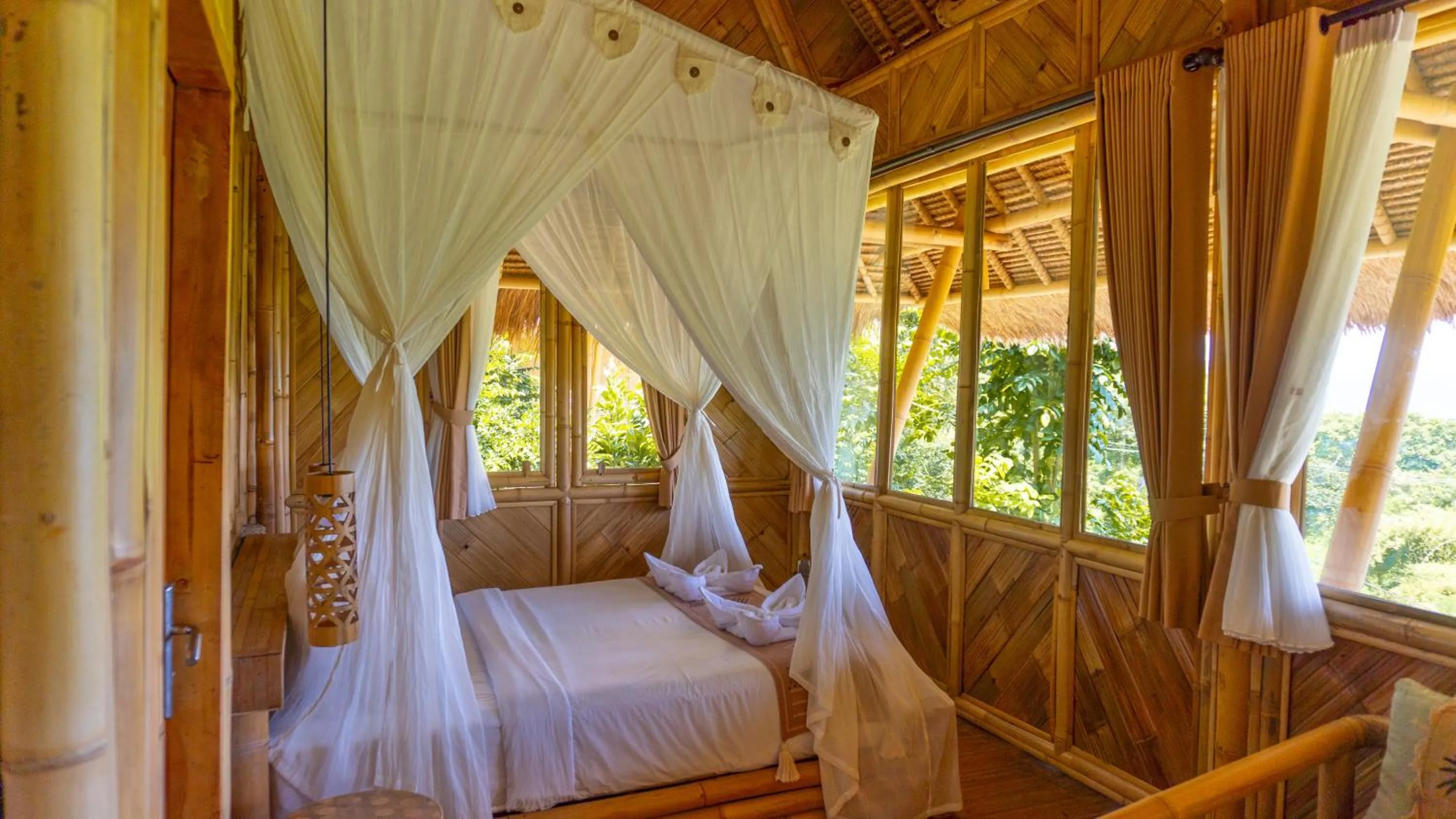 Bed in Elang Hillside Bamboo Villas