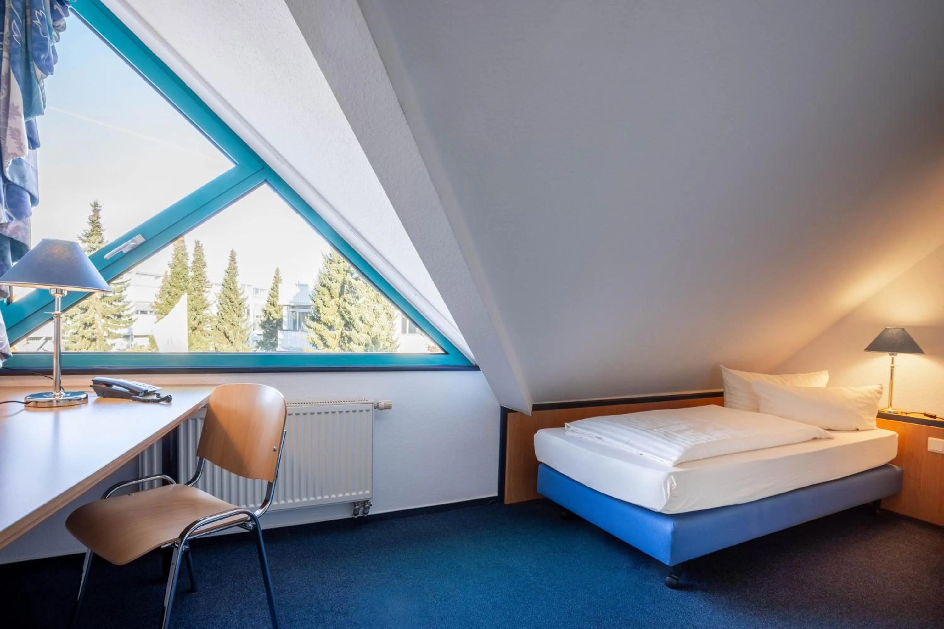 Photo of the whole room, Bed in Montana Trend Hotel Lehrte