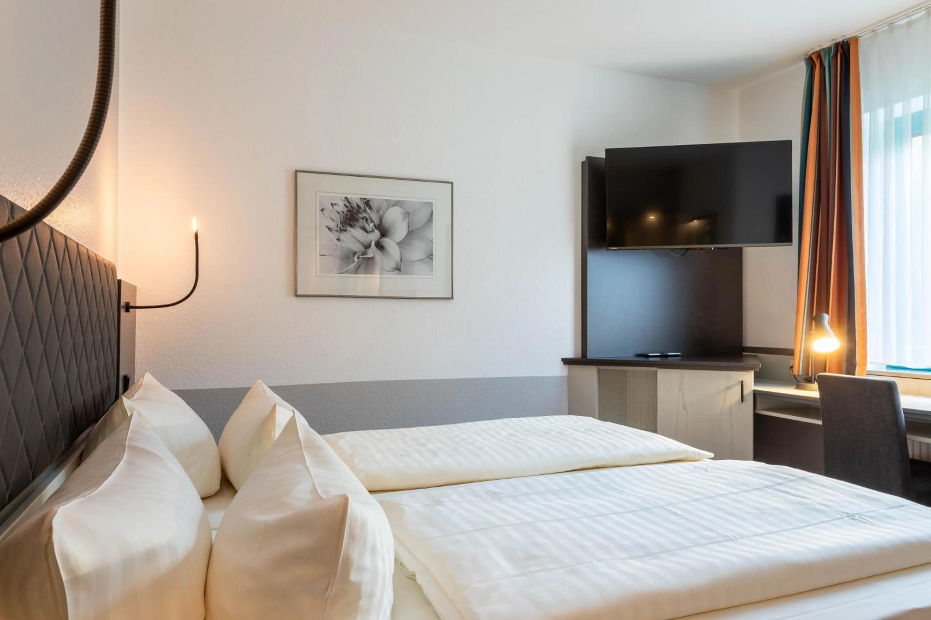 Bed in Montana Trend Hotel Lehrte