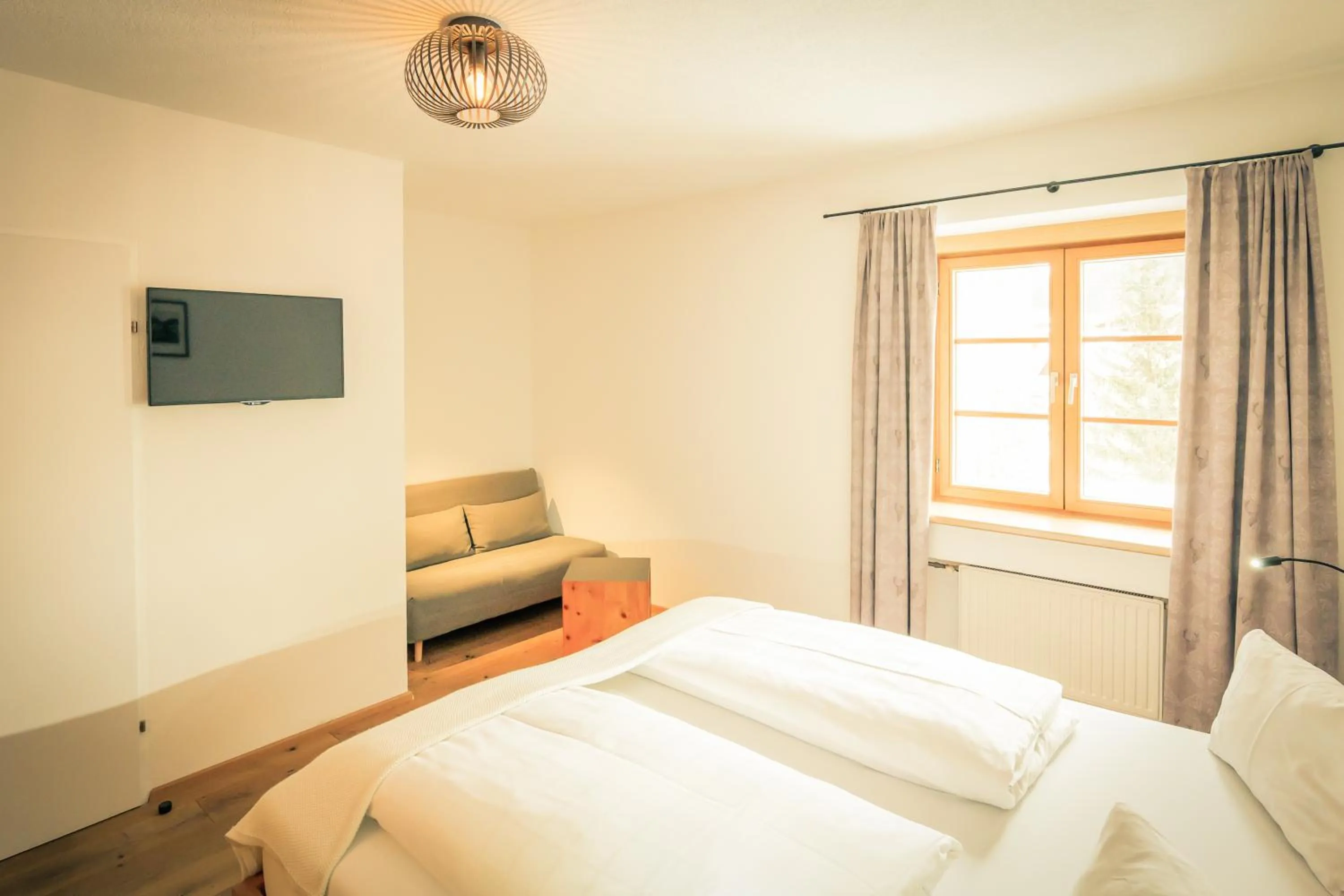 Living room, Bed in Posthotel Lechtal, Arlberg