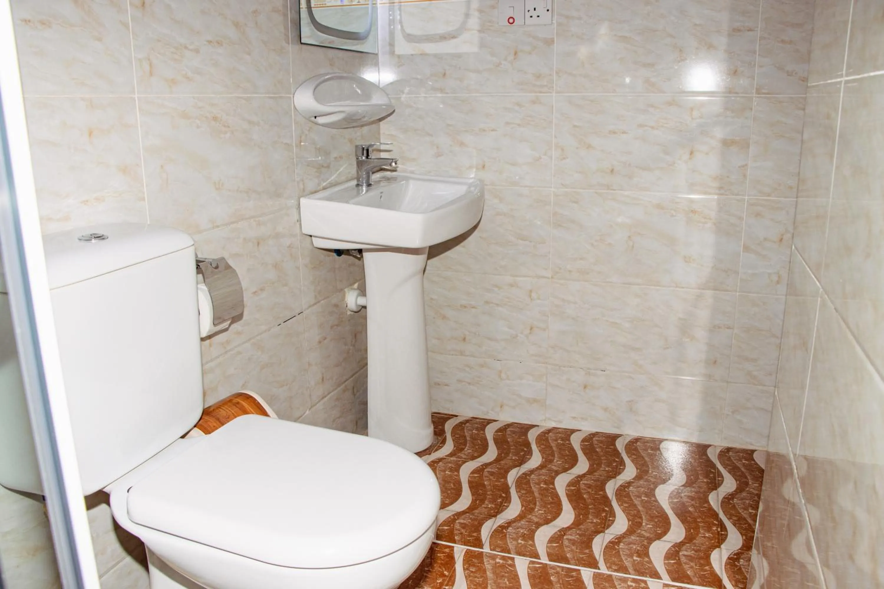 Toilet in Sunny Palms Beach Bungalows