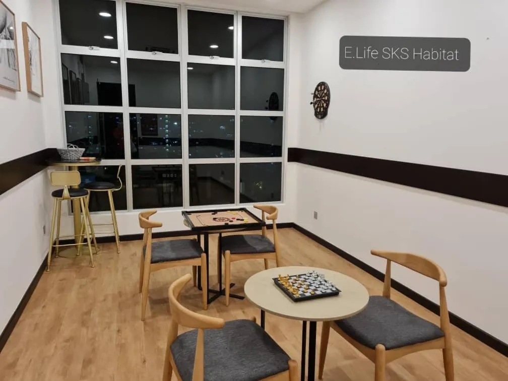 Seating area in E Life SKS Habitat With WiFi Netflix