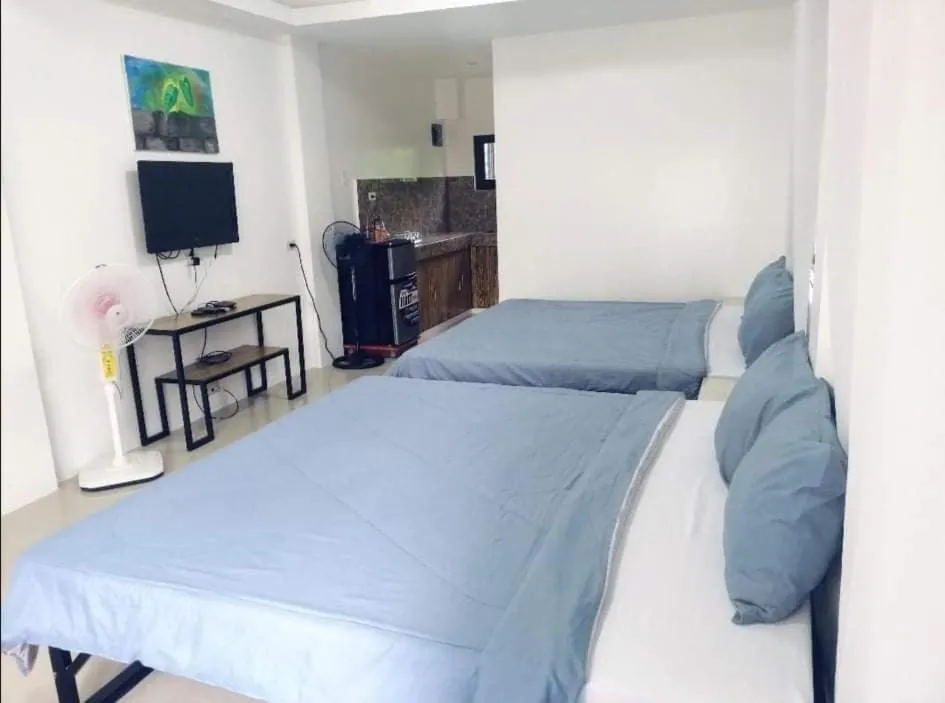 Bed in Purple Orchid Bed and Breakfast