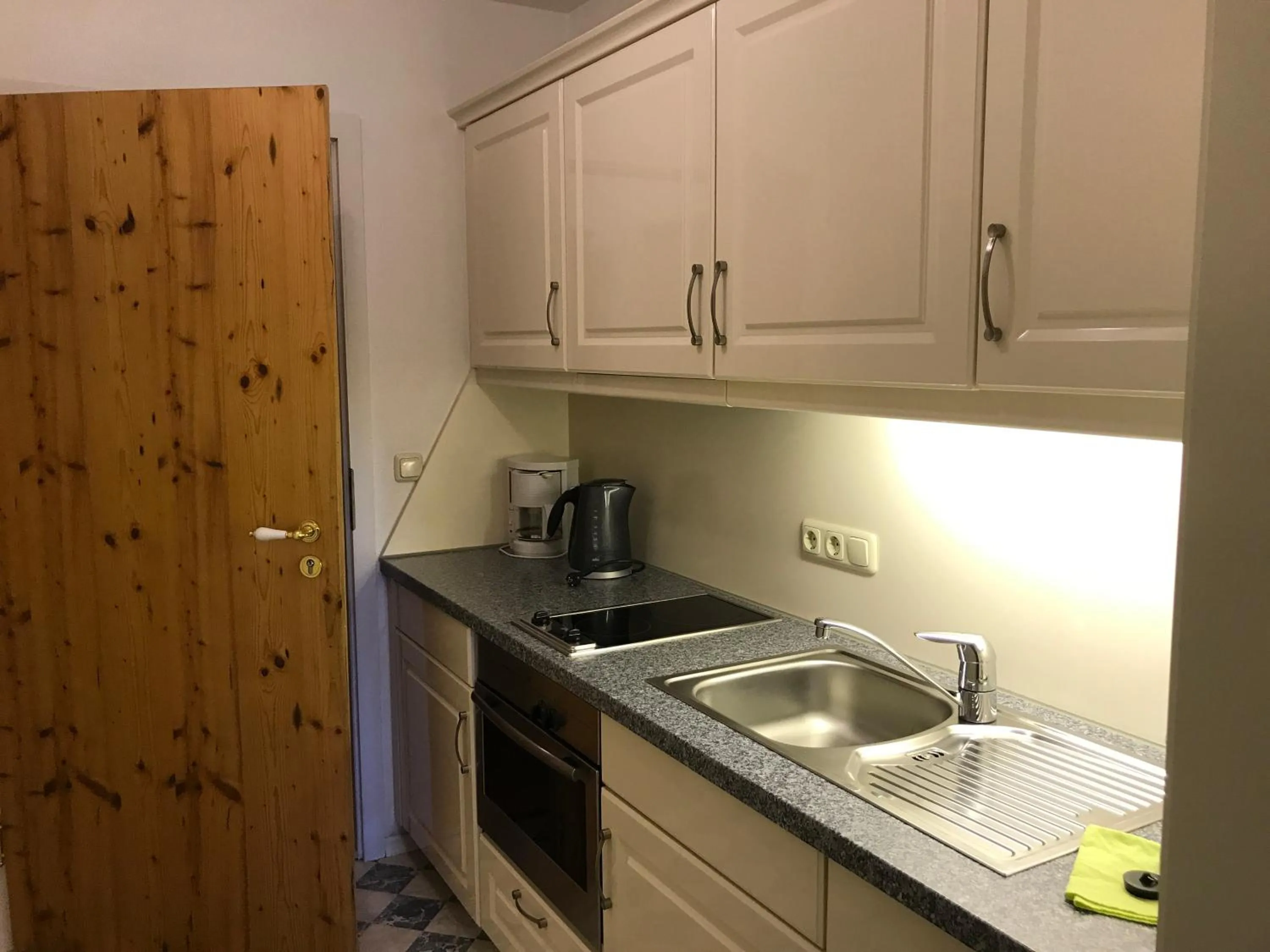 Kitchen or kitchenette in Landhaus Kössel