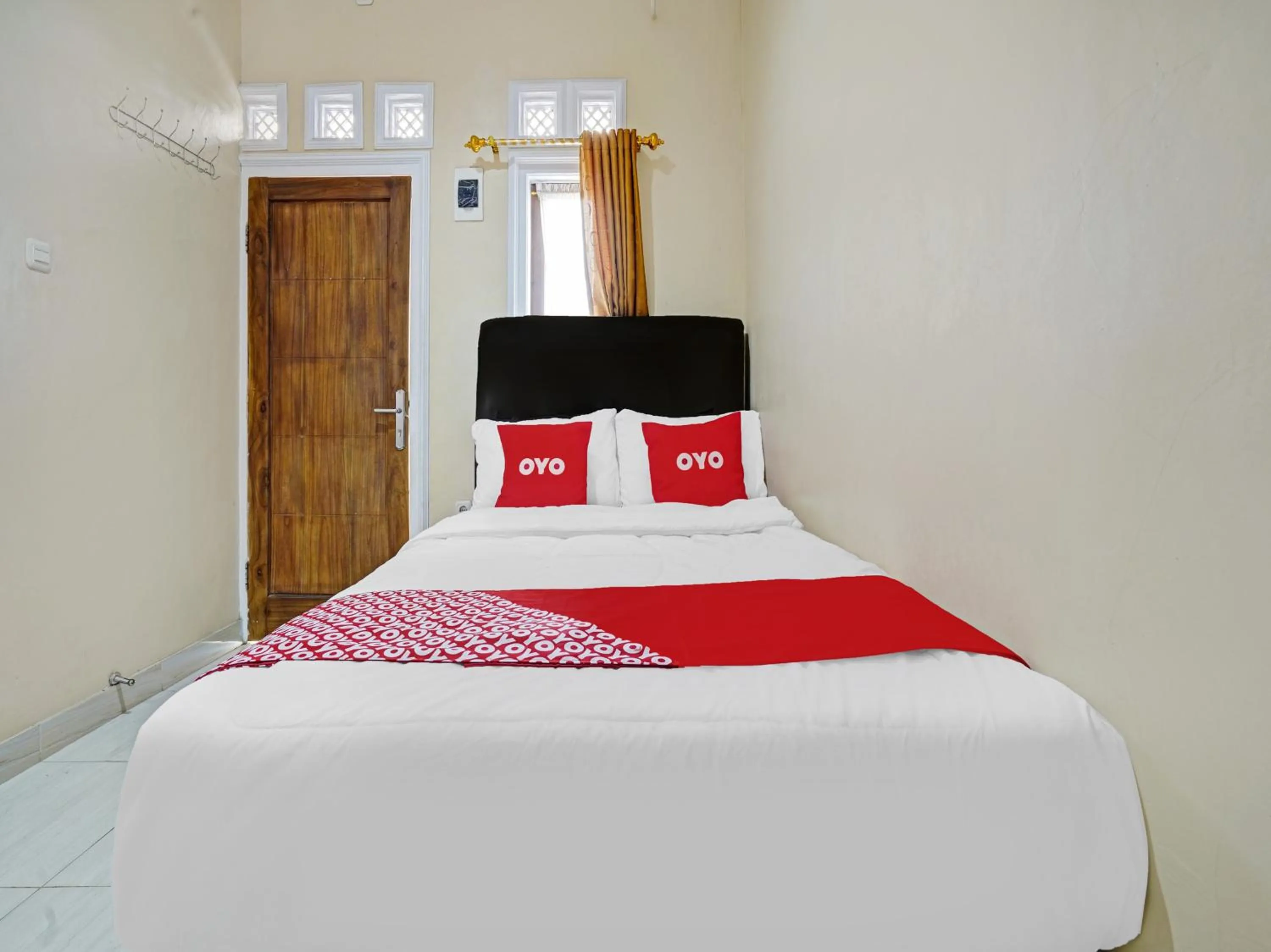 Bedroom in OYO 90416 Wisma Wayang Ajen Syariah