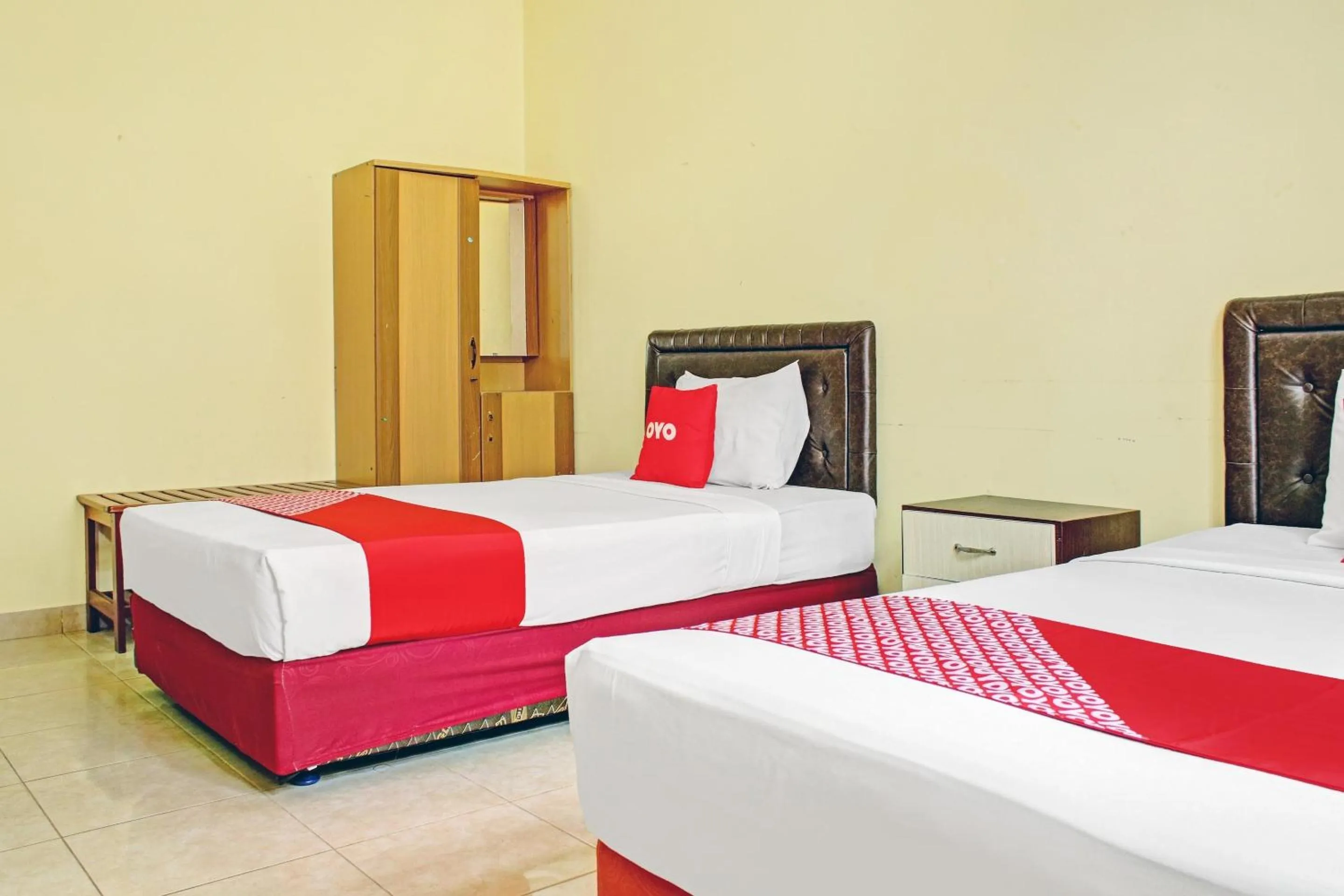 Bedroom in Hotel O Aman