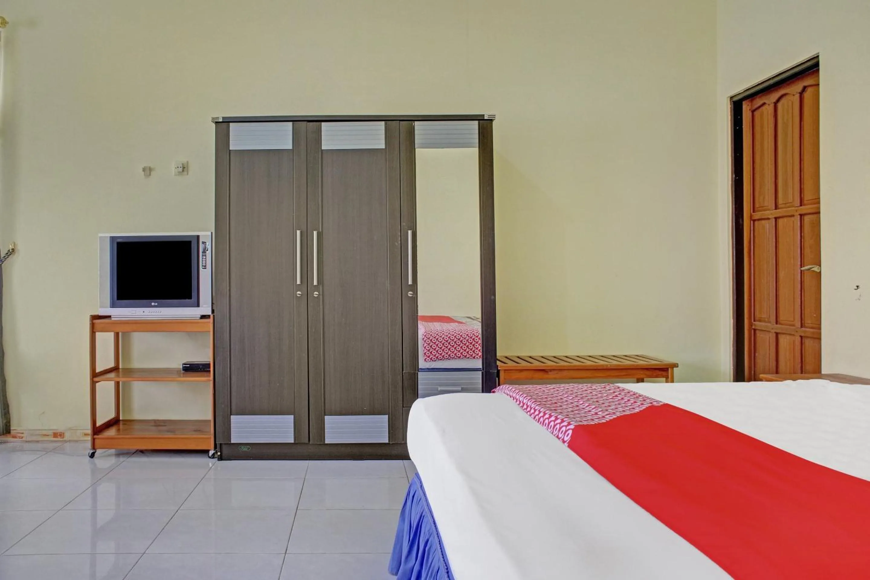 Bedroom in Hotel O Aman