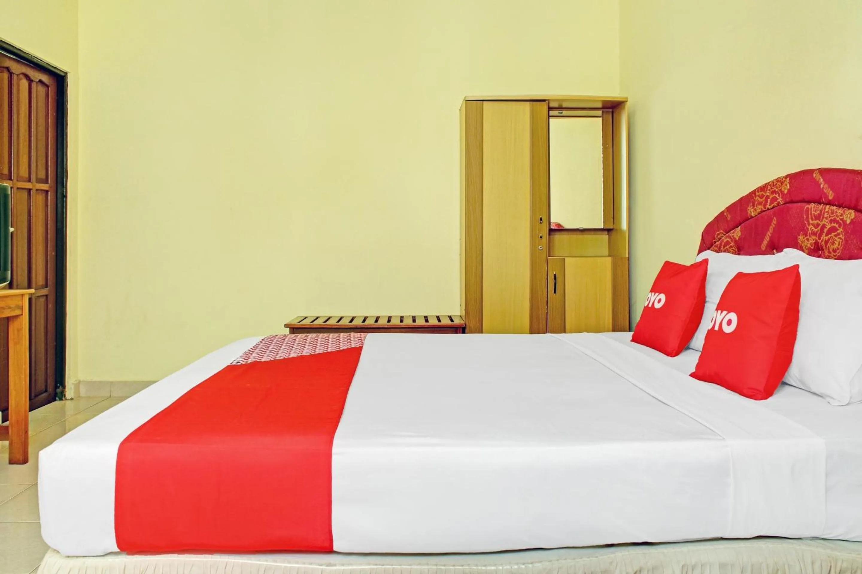 Bedroom in Hotel O Aman