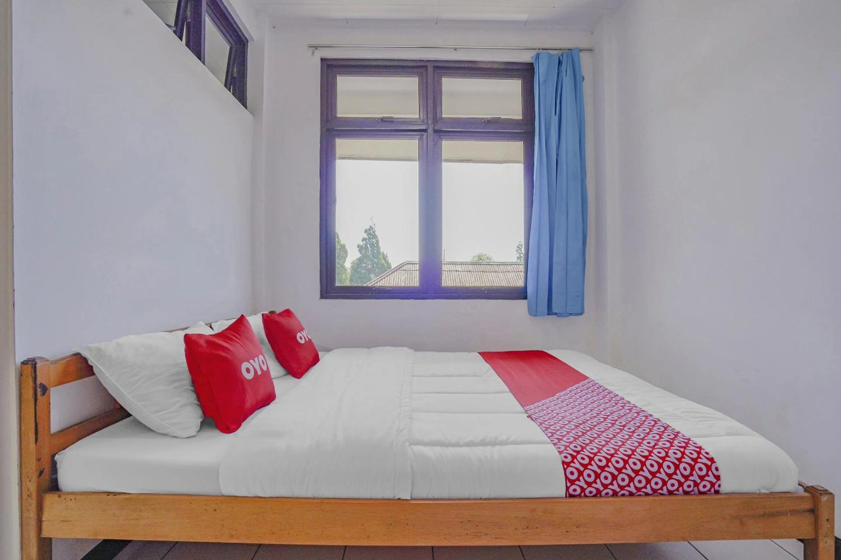 Bedroom in OYO 90352 Villa Agape 2