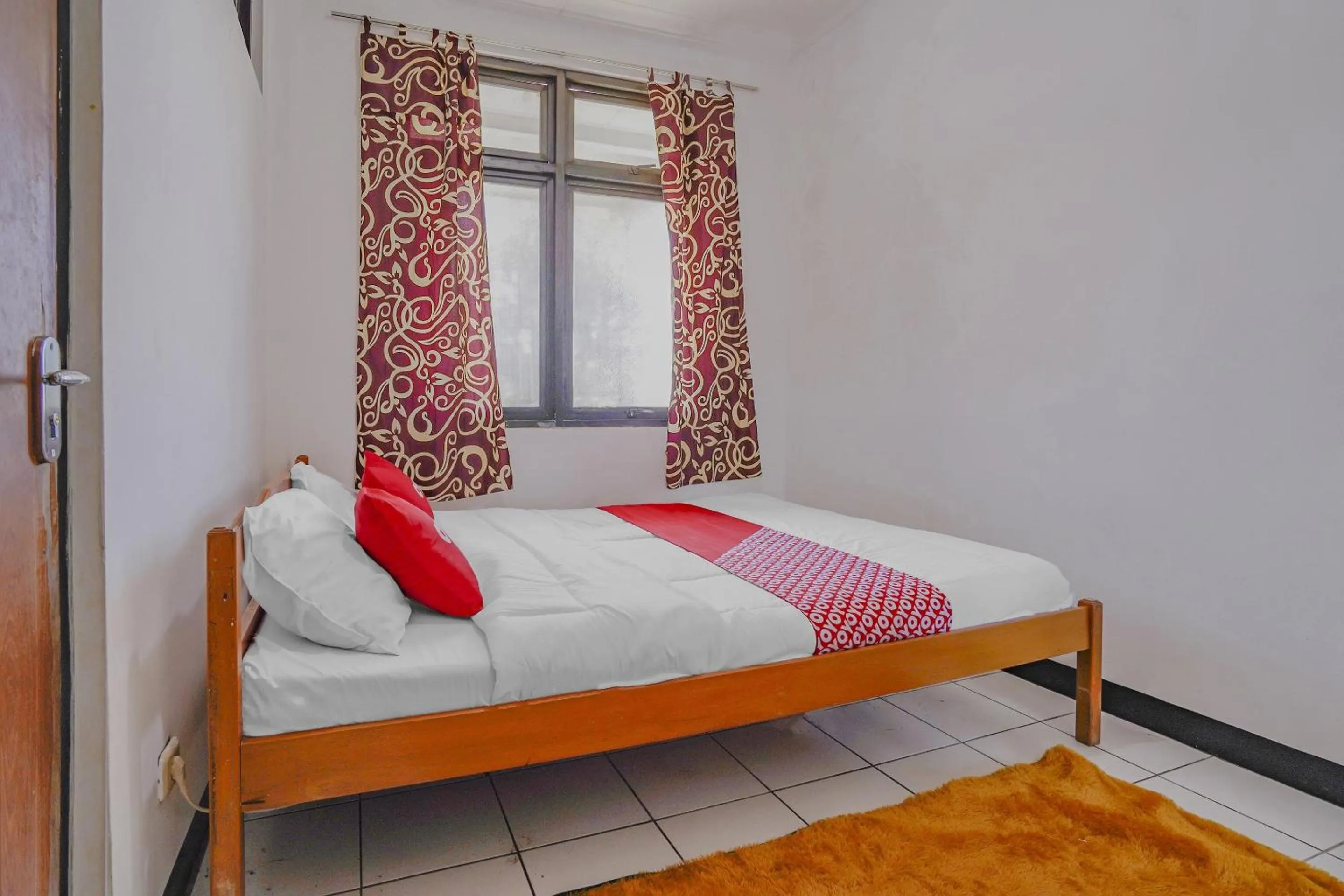 Bedroom in OYO 90352 Villa Agape 2