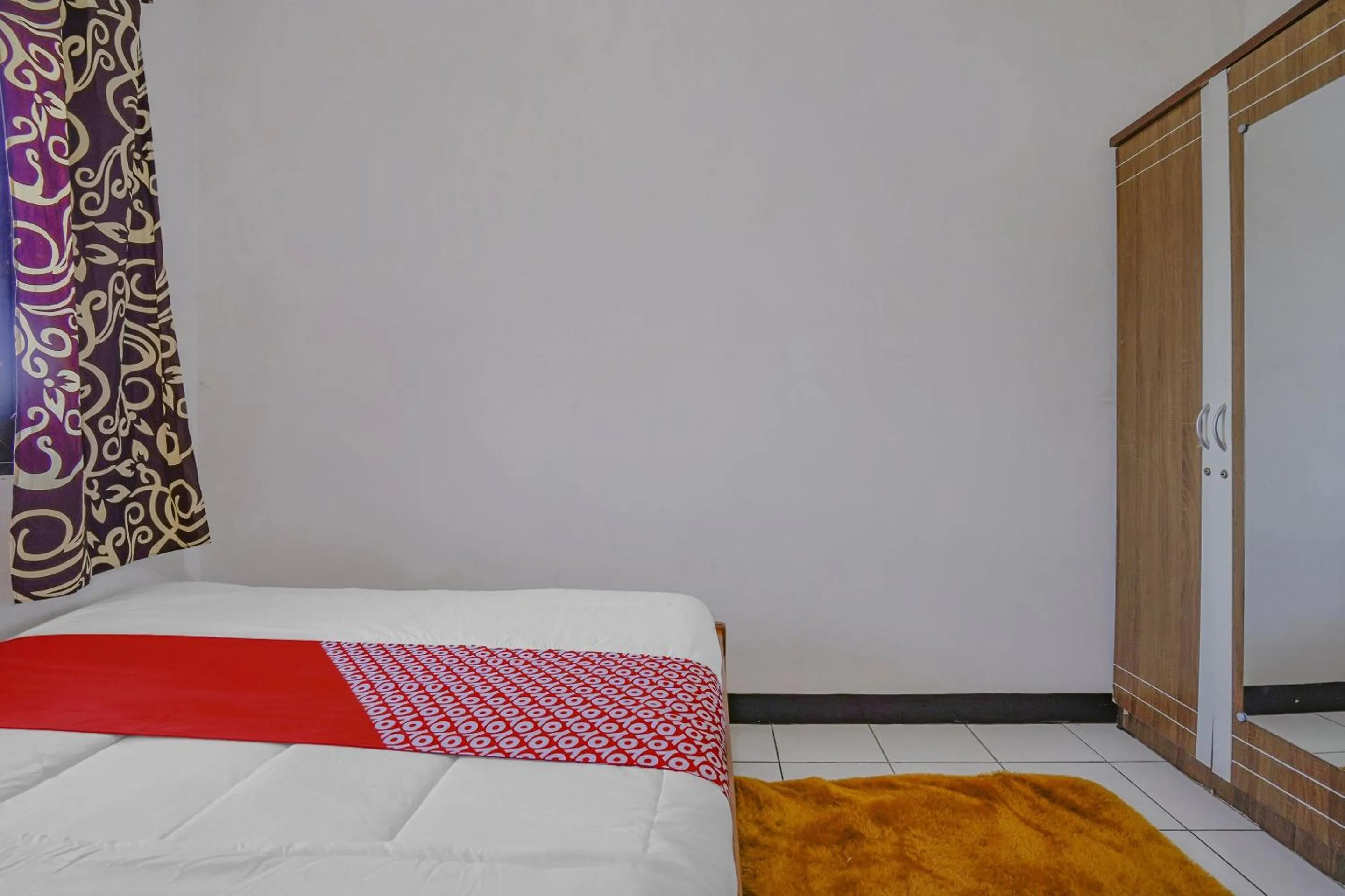 Bedroom in OYO 90352 Villa Agape 2